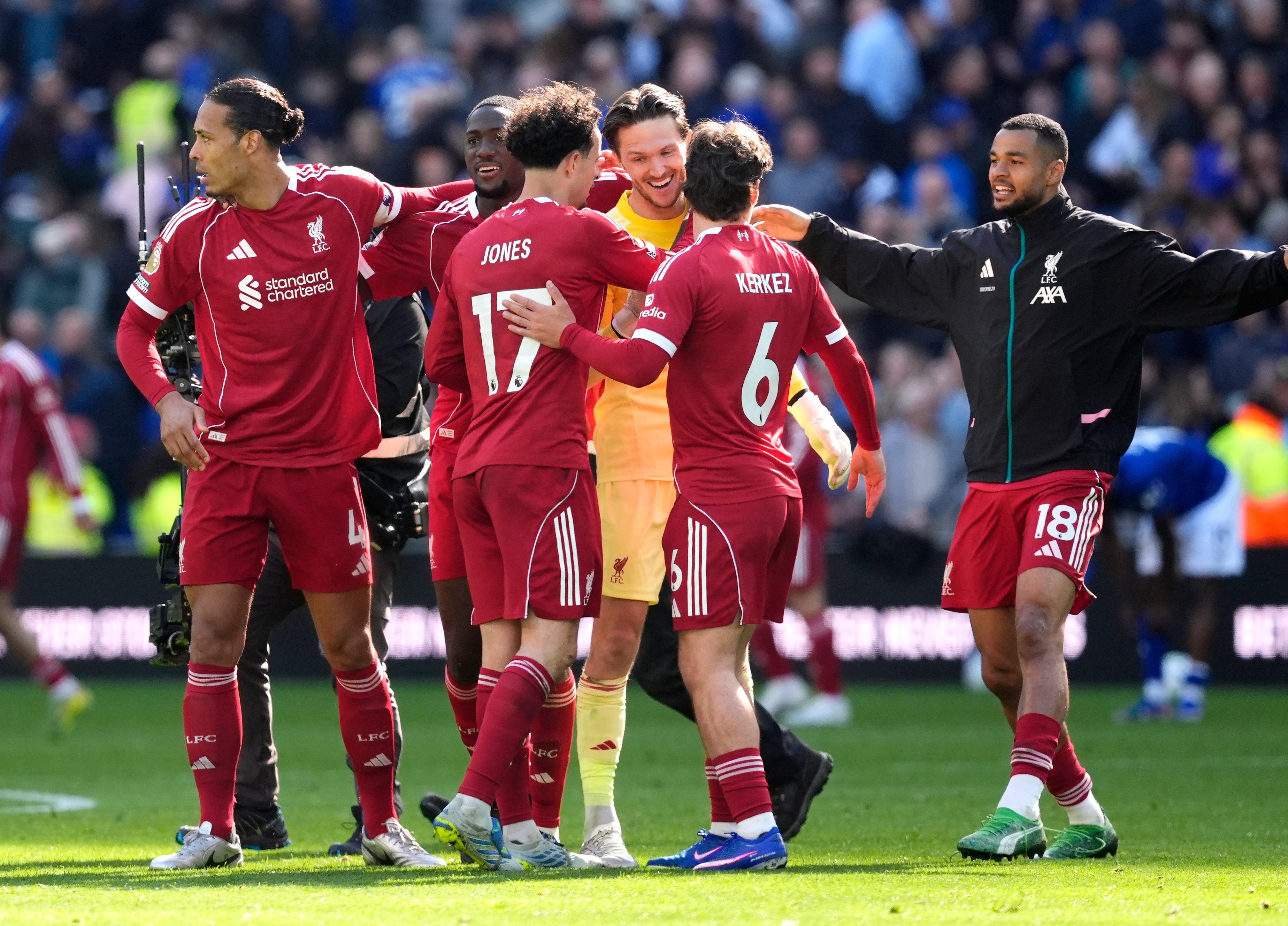 Liverpool players congratulate goalkeeper Freddie Woodman following the 2-1 win