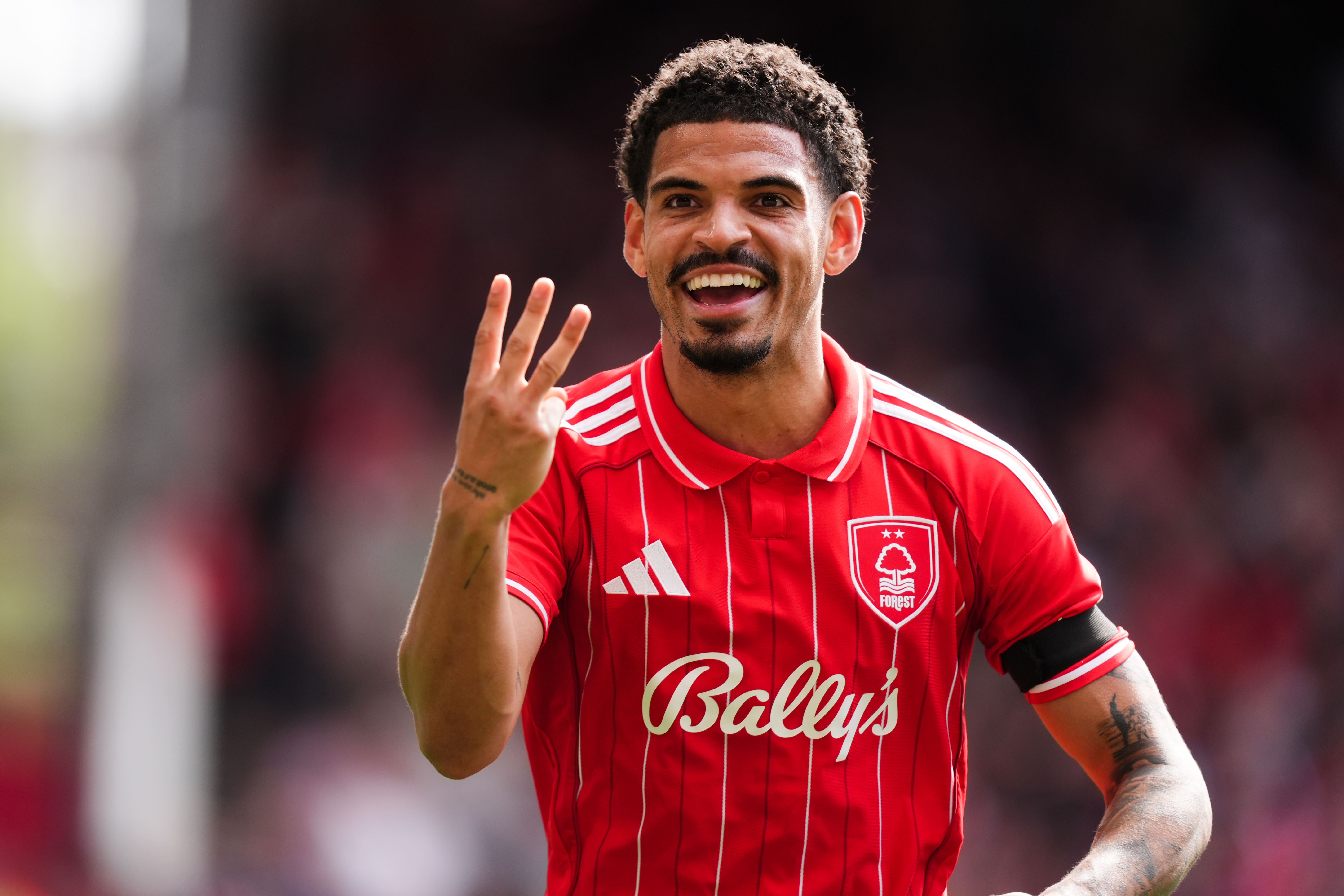 Nottingham Forest’s Morgan Gibbs-White celebrates scoring his side’s third goal to complete his hat-trick (Mike Egerton/PA)