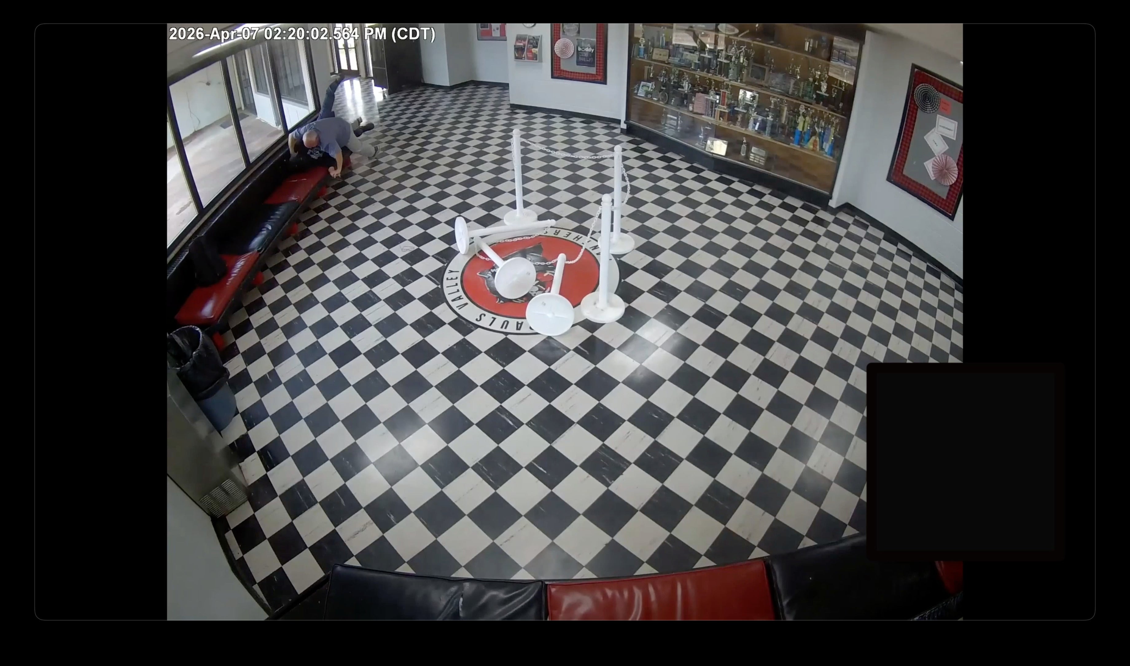 Surveillance video captured Moore tackling the would-be shooter to the ground earlier this month