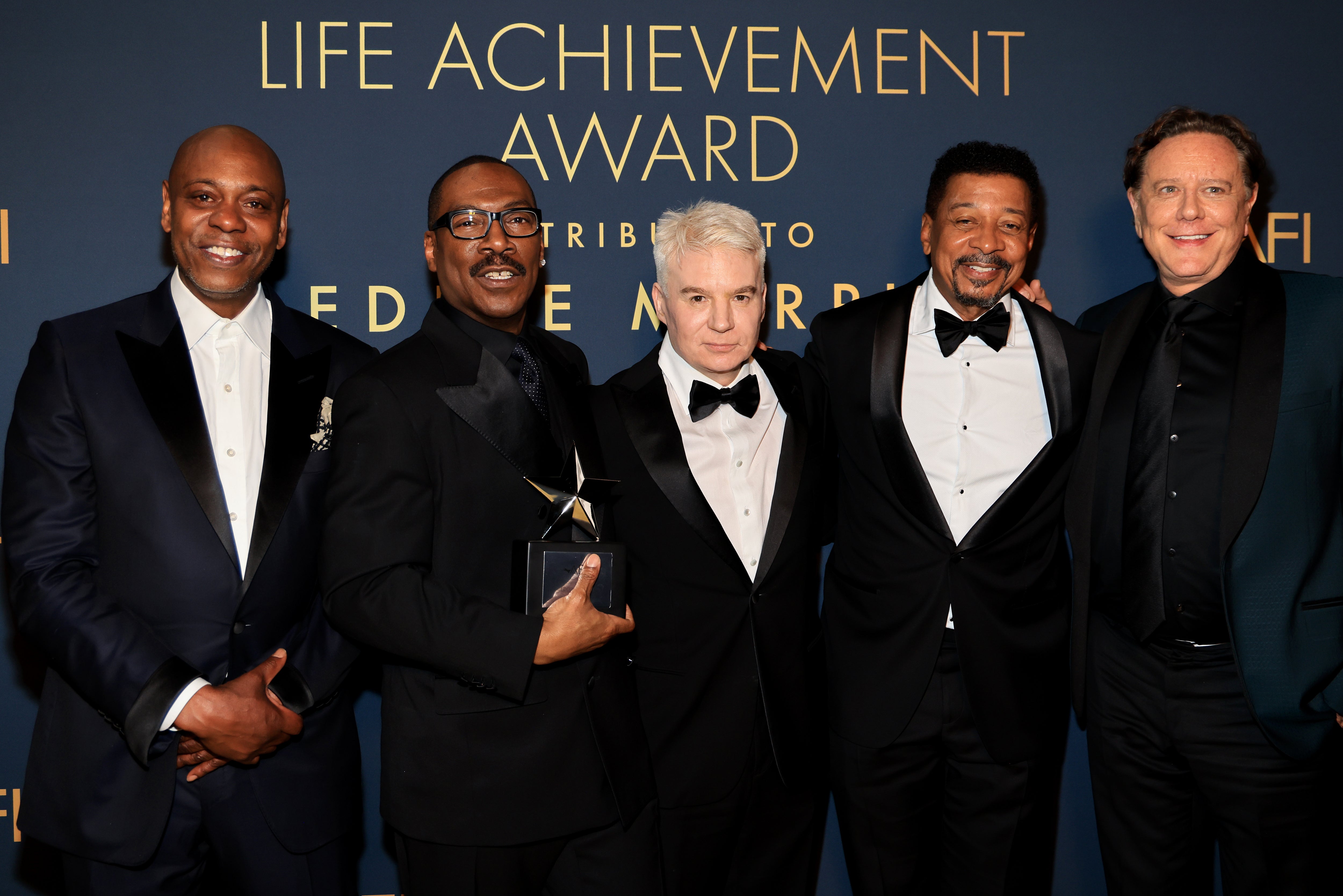 Dave Chappelle, Eddie Murphy, Mike Myers, Robert Townsend, and Judge Reinhold attend the 51st AFI Life Achievement Award: A Tribute To Eddie Murphy