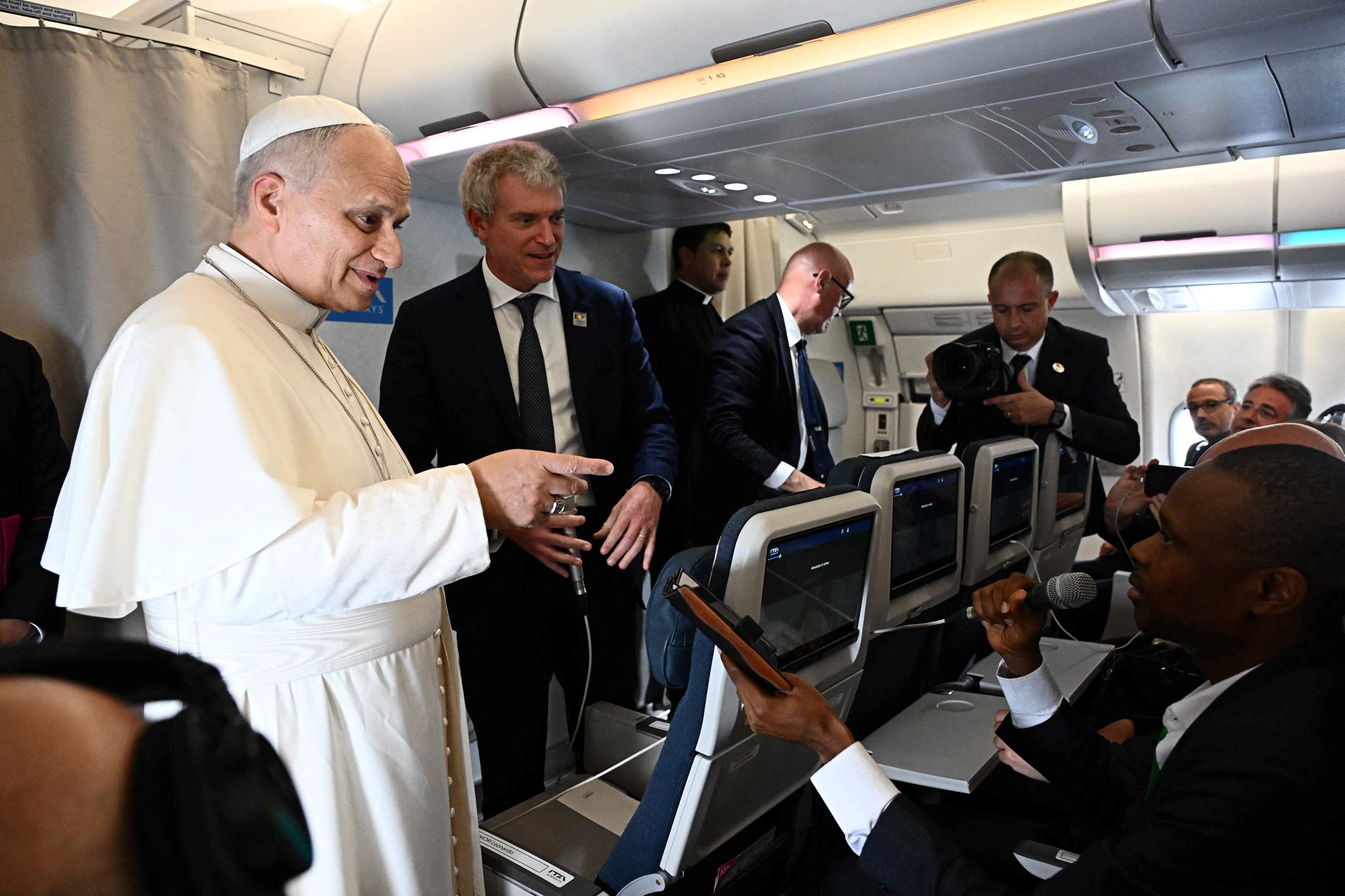 Pope Leo XIV speaks to journalists aboard a flight on his way to Luanda, Angola, 18 April 2026