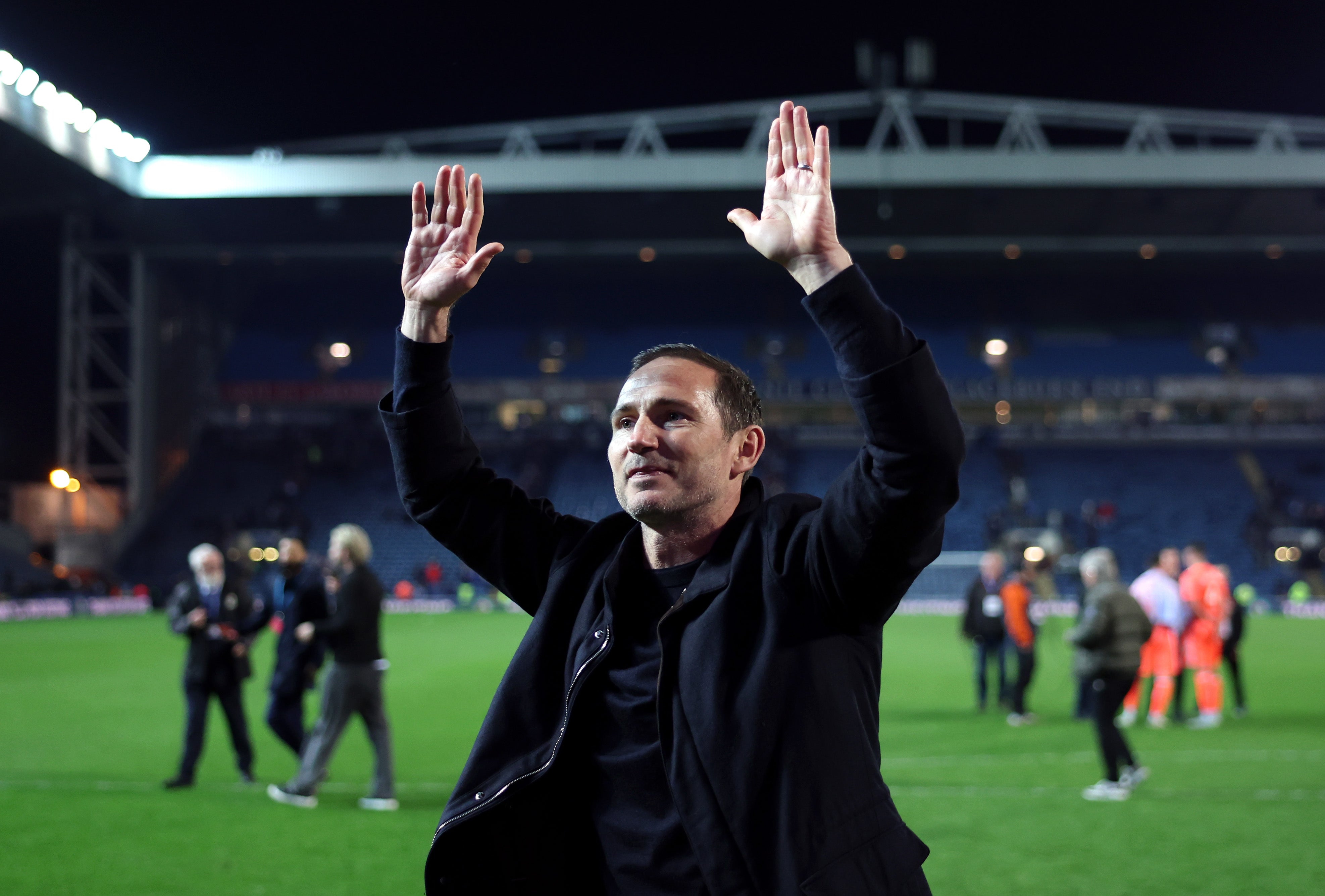 Lampard salutes the Coventry fans after confirming promotion at Ewood Park