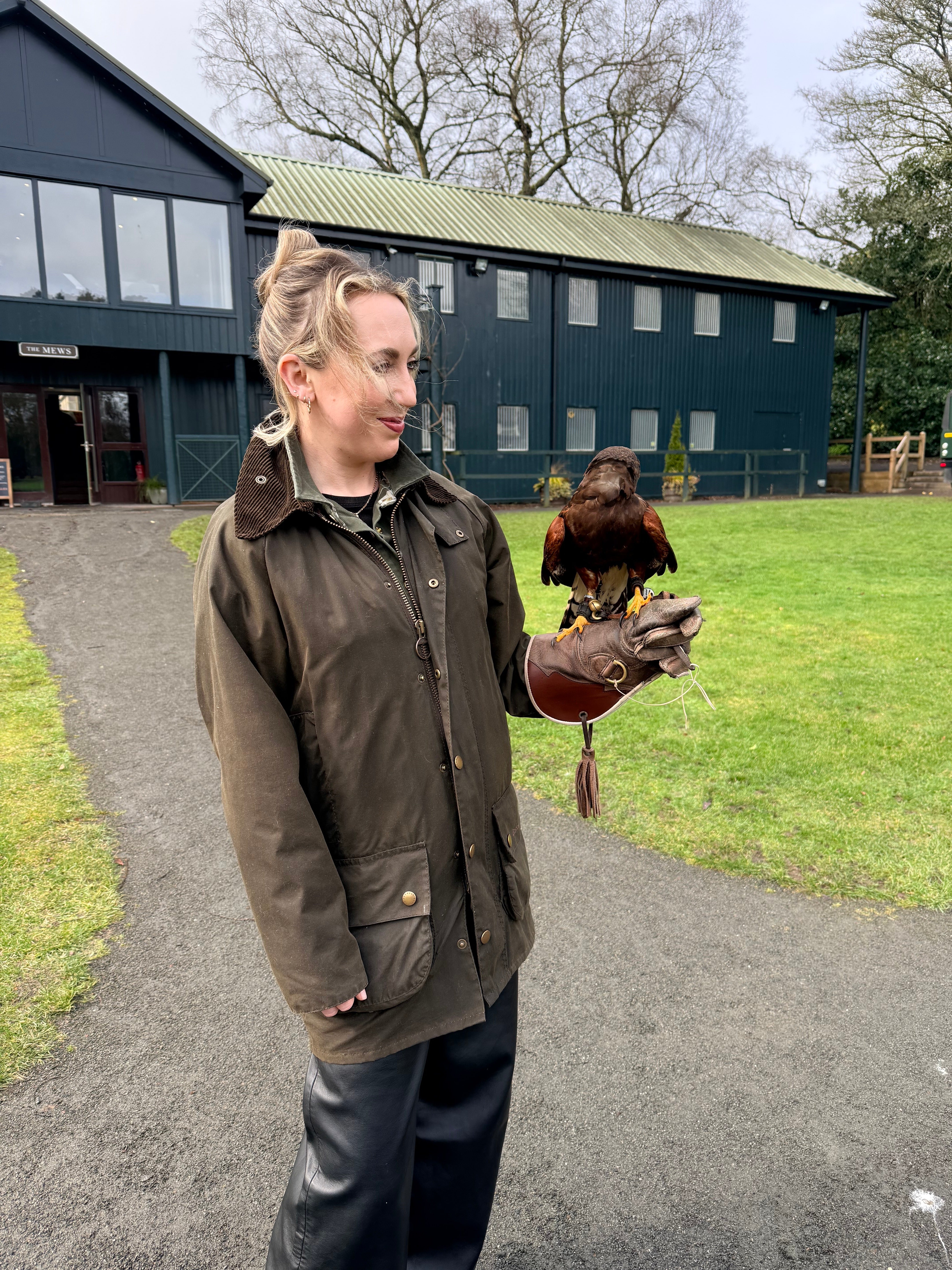 Helen taking part in falconry at Gleneagles