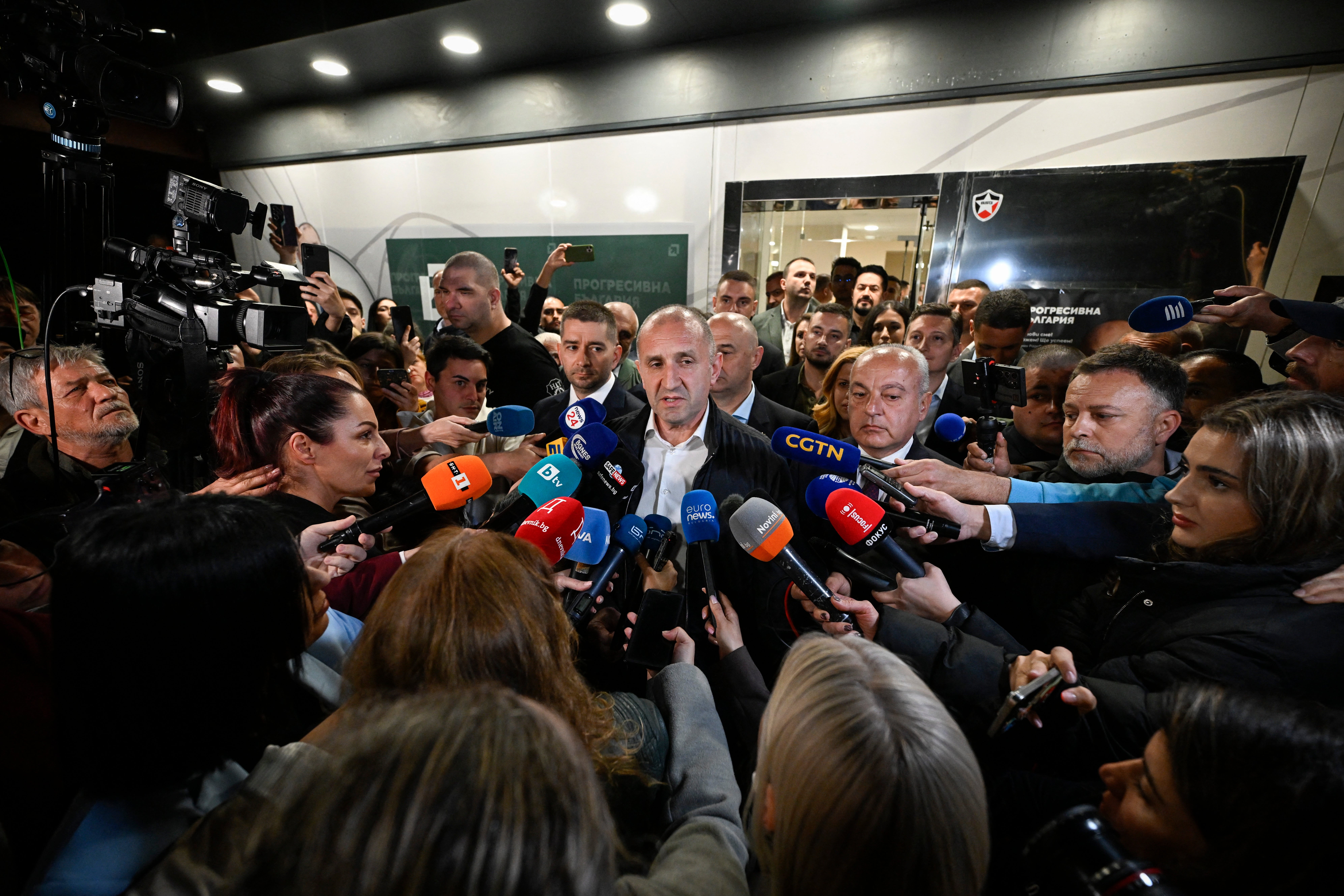 Progressive Bulgaria' coalition's leader and former President Rumen Radev speaks to the press at his party headquarters after polls closed in Bulgaria's parliamentary elections in Sofia on April 19, 2026
