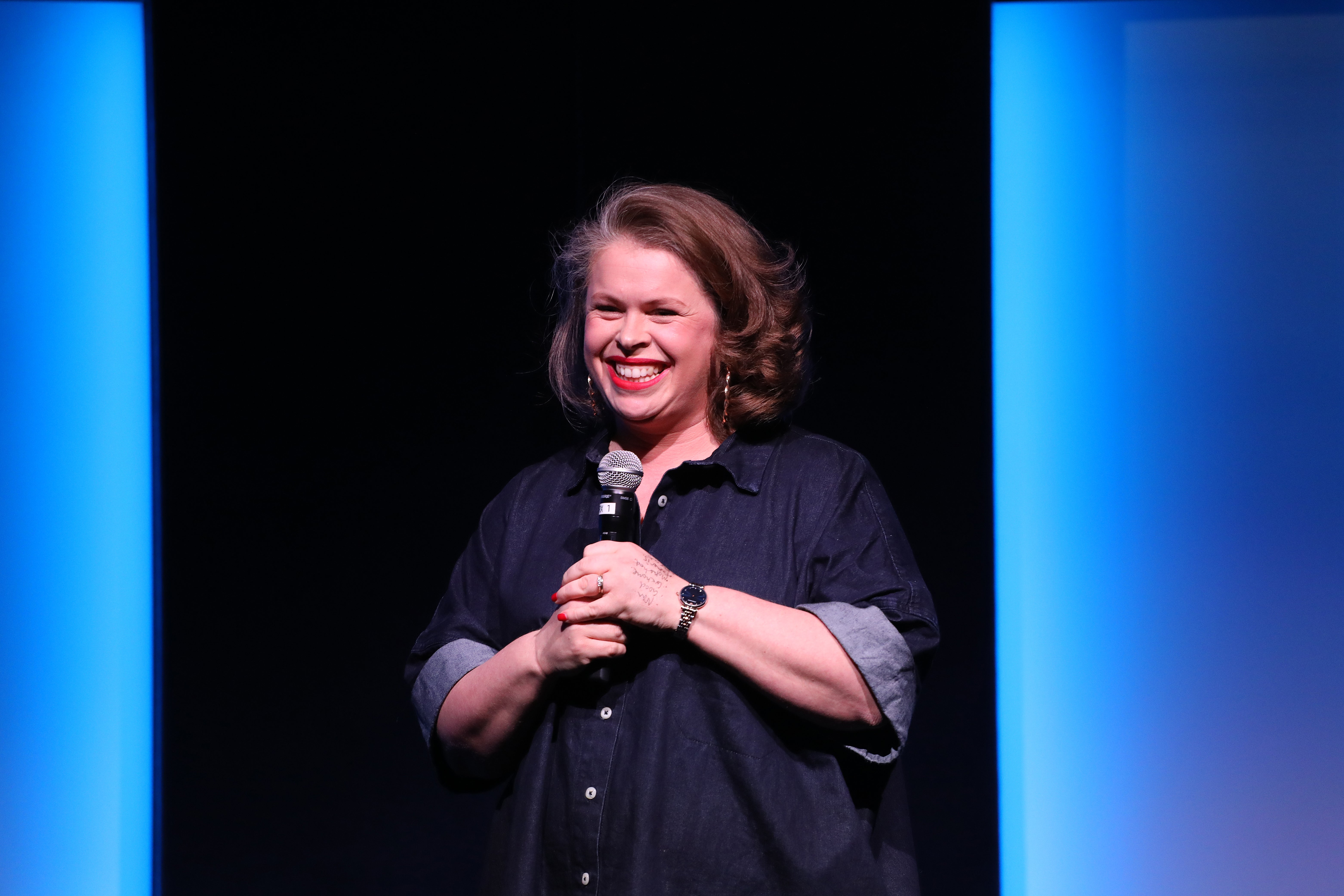 Comedian Laura Smyth on stage in 2020