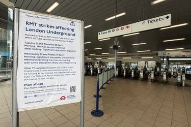 <p>A sign warns travellers at Stratford underground station of the upcoming industrial action by the RMT union</p>