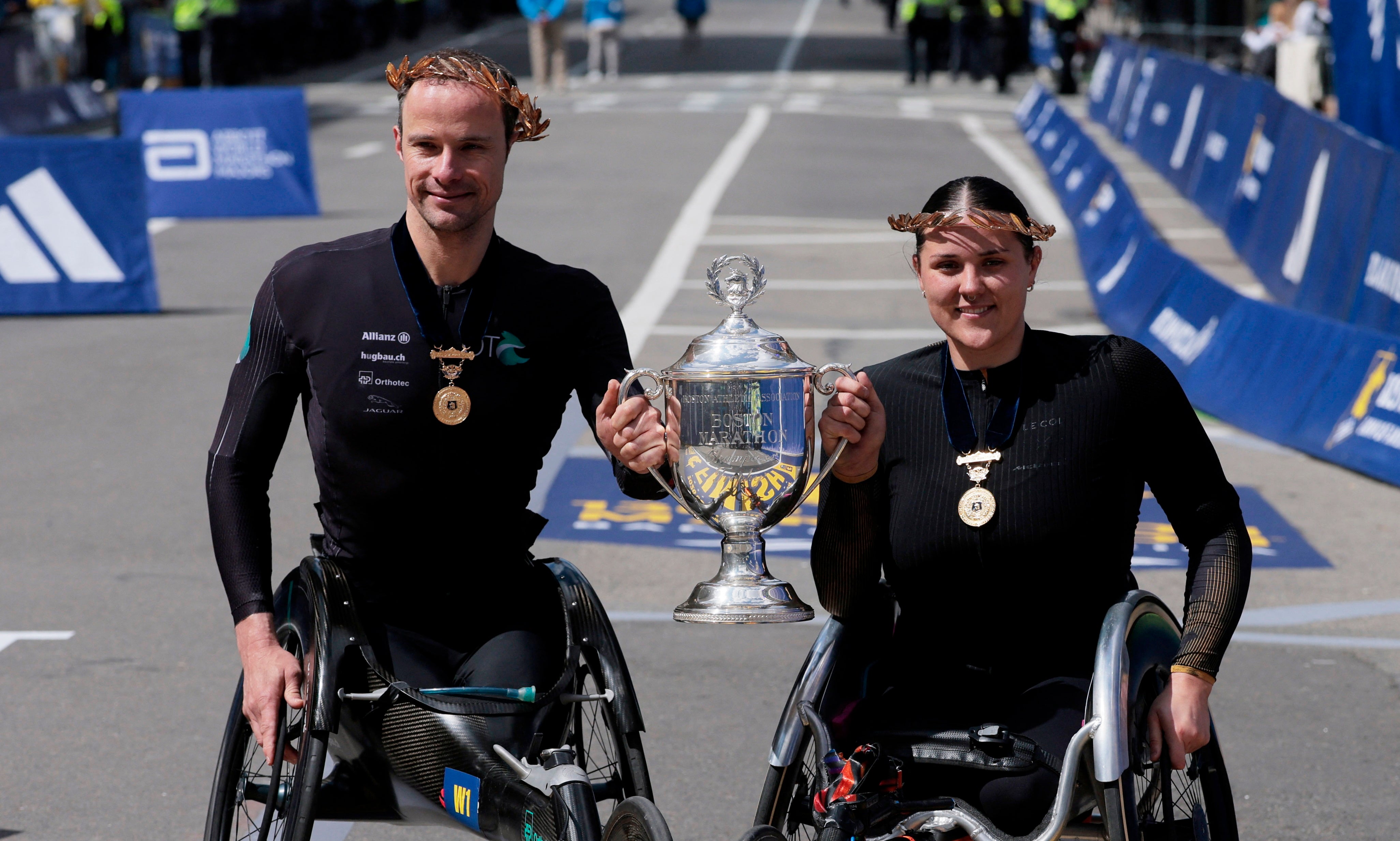 Marcel Hug and Eden Rainbow-Cooper claimed the wheelchair titles