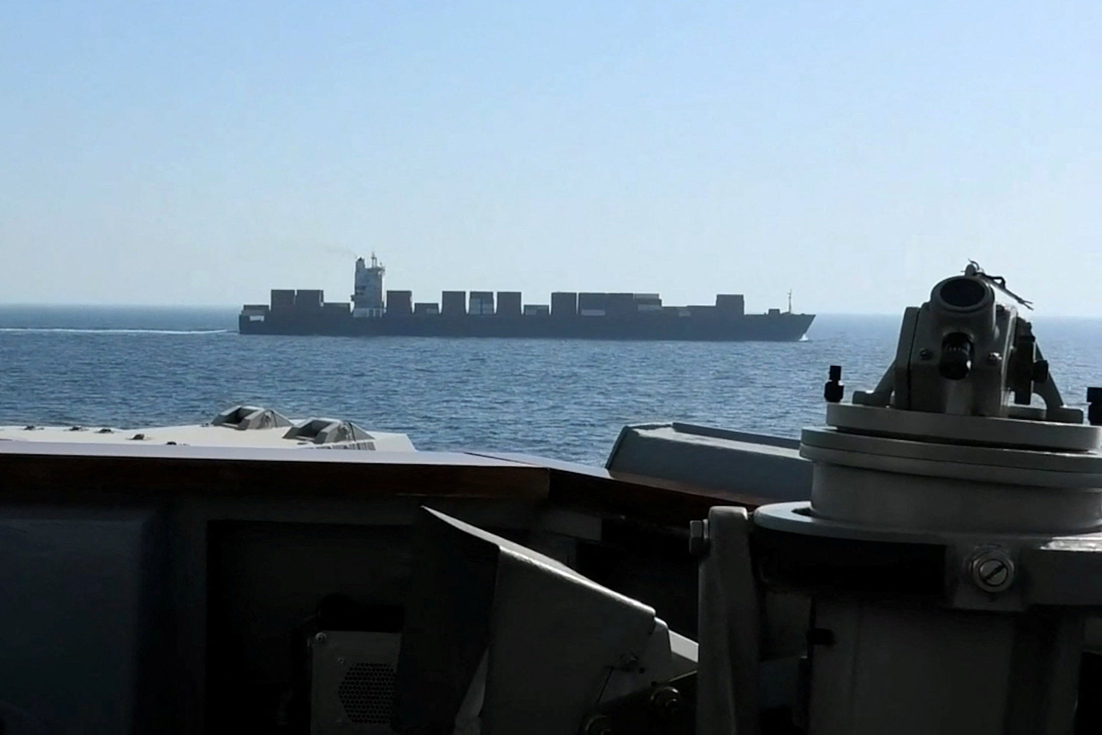 The USS Spruance, a Burke-class Aegis guided missile destroyer, intercepts an Iranian-flagged cargo ship in the Arabian Sea