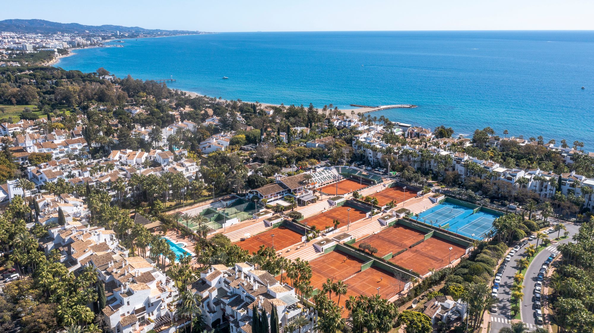 The tennis club features eight clay courts