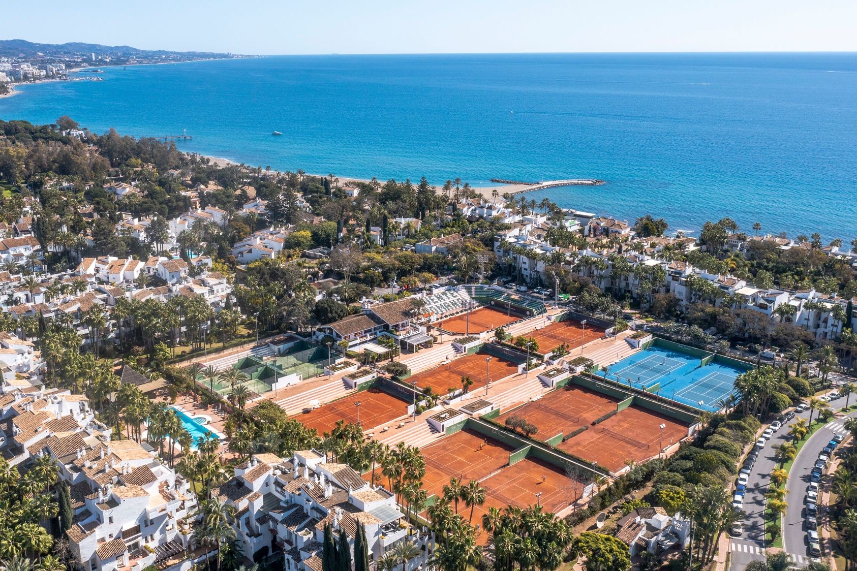 The tennis club features eight clay courts (Supplied)