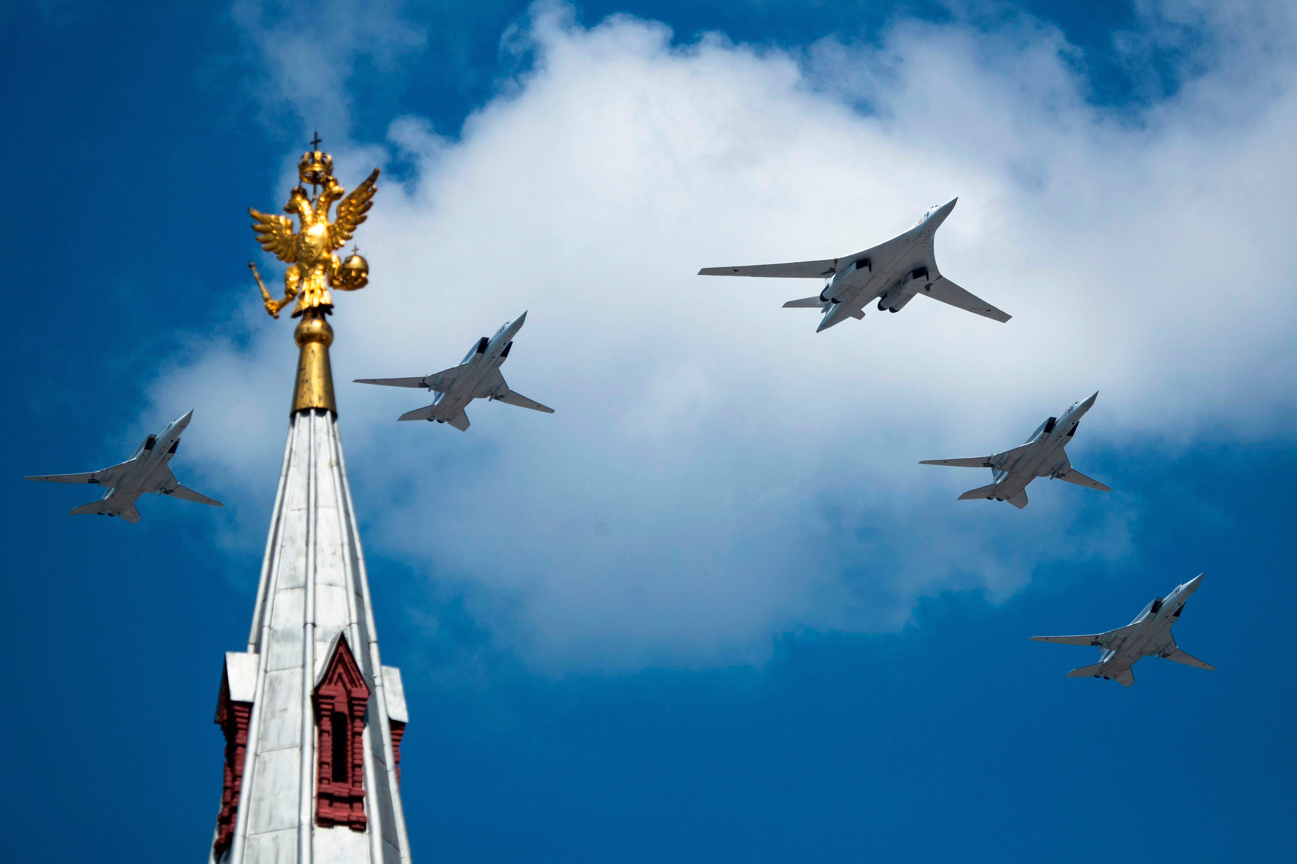 A Tupolev Tu-160 and Tu-22M3 military aircrafts fly over Red Square (file)