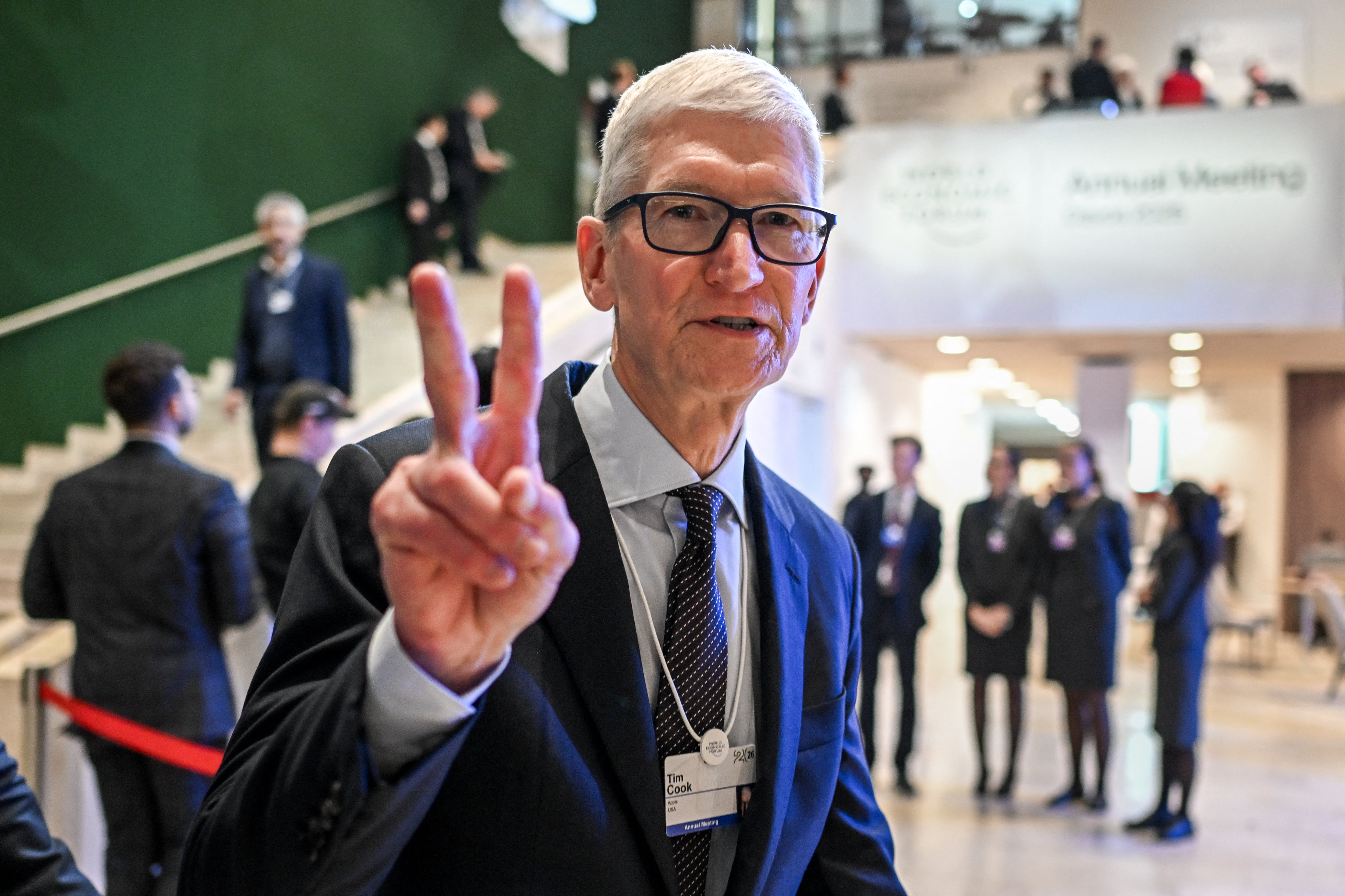 Since replacing Steve Jobs in 2011, Cook — seen here at the Davos summit in January 2026 — has had to strike a delicate balance in politics and geopolitics
