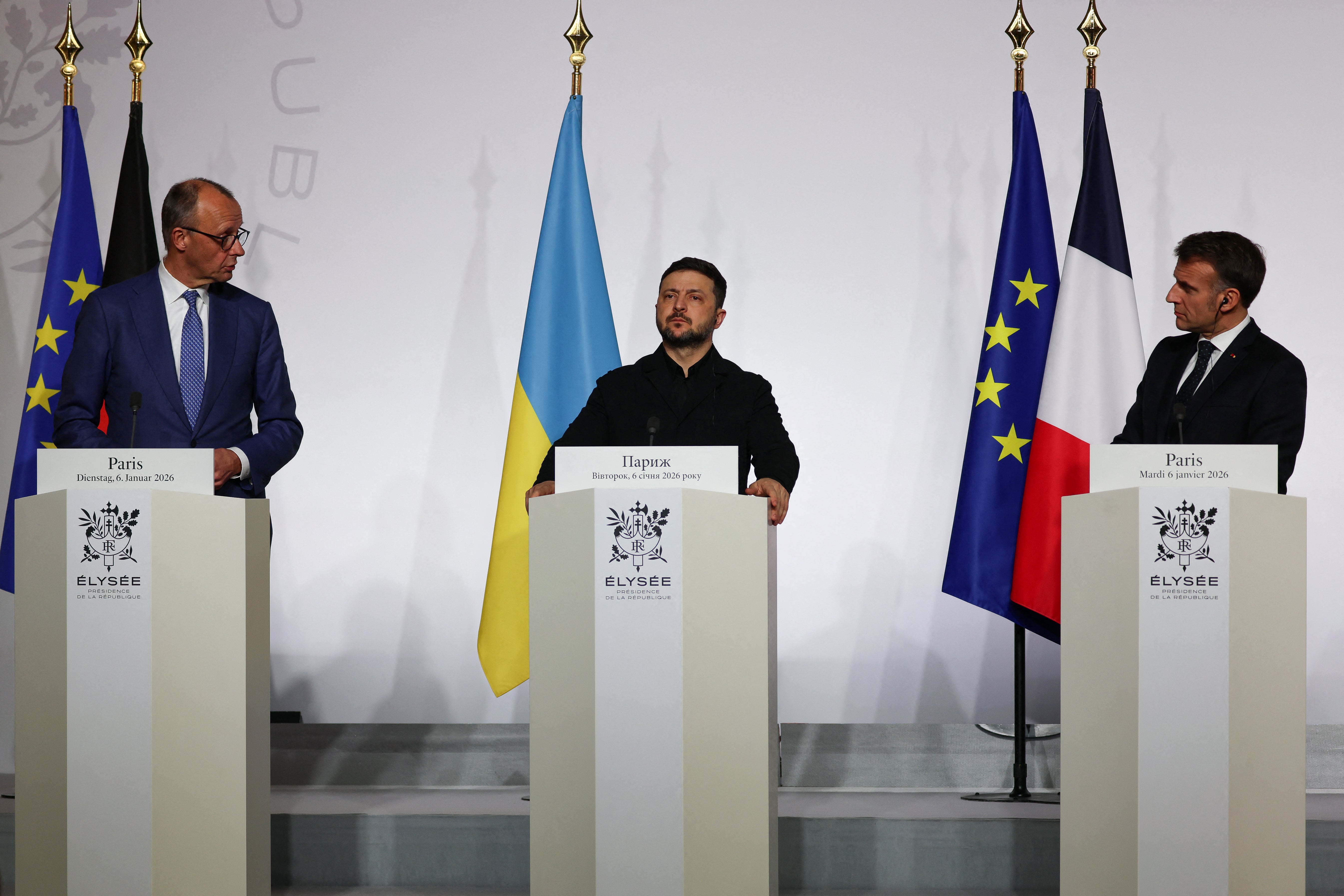 Germany's chancellor Friedrich Merz, Ukraine's president Volodymyr Zelensky and France's president Emmanuel Macron deliver a press conference at the Elysee Palace in Paris