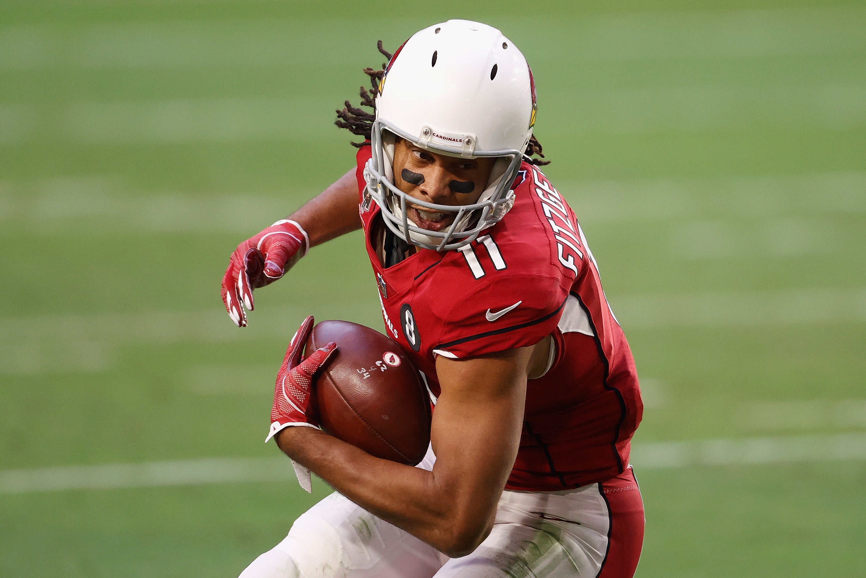 Larry Fitzgerald played for the Arizona Cardinals until retiring in 2020. He joined the Pro Football Hall of Fame earlier this year