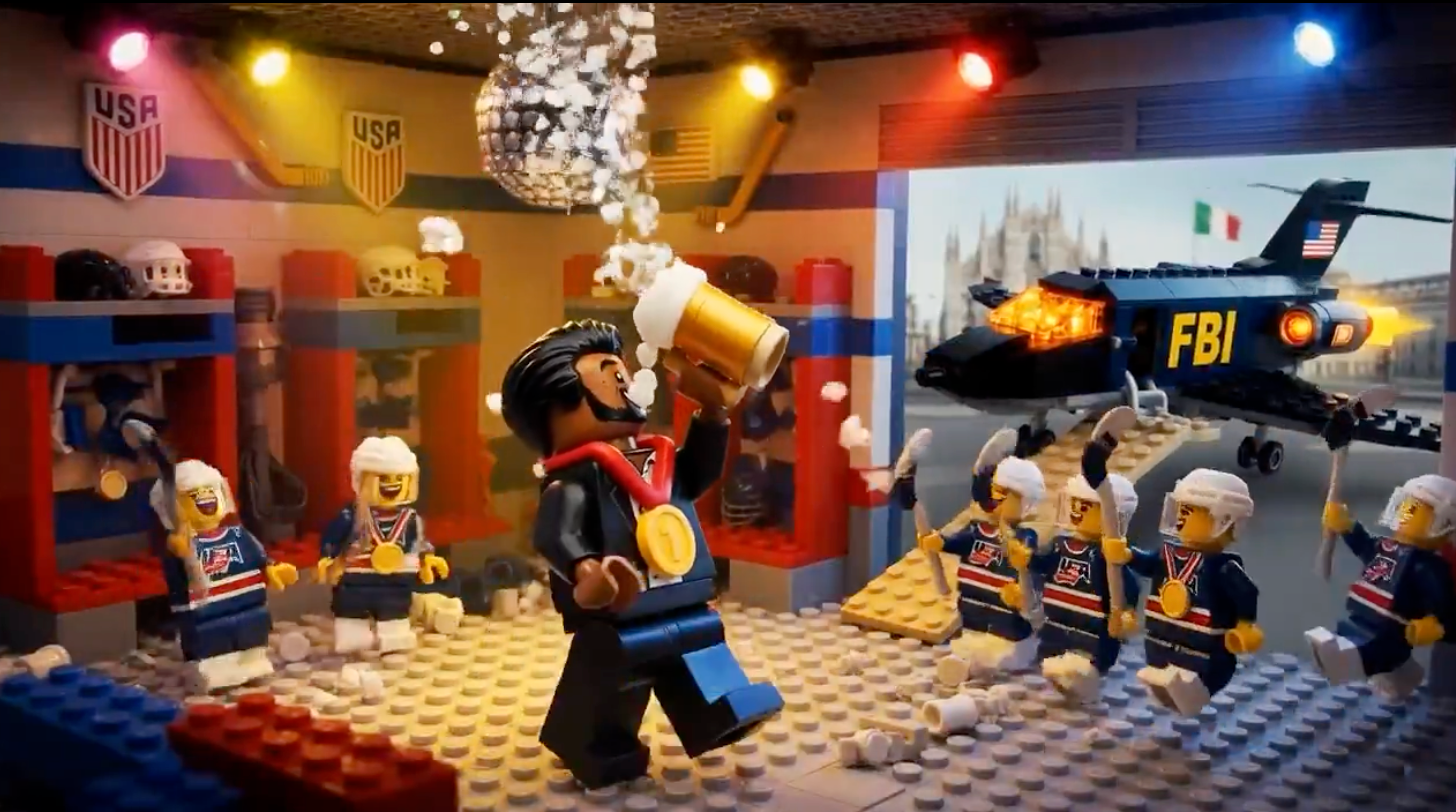 The creators of AI's music video included a scene of Patel drinking in the locker room of the U.S. Olympic men's hockey team. In the background, an FBI jet can be seen parked in Milan. Patel was accused of excessive drinking in a recent profile, but Patel denies the allegations and filed a lawsuit over the article.