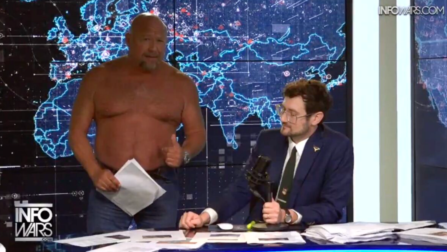 Alex Jones takes off shirt for unhinged rant about  InfoWars becoming a satire site