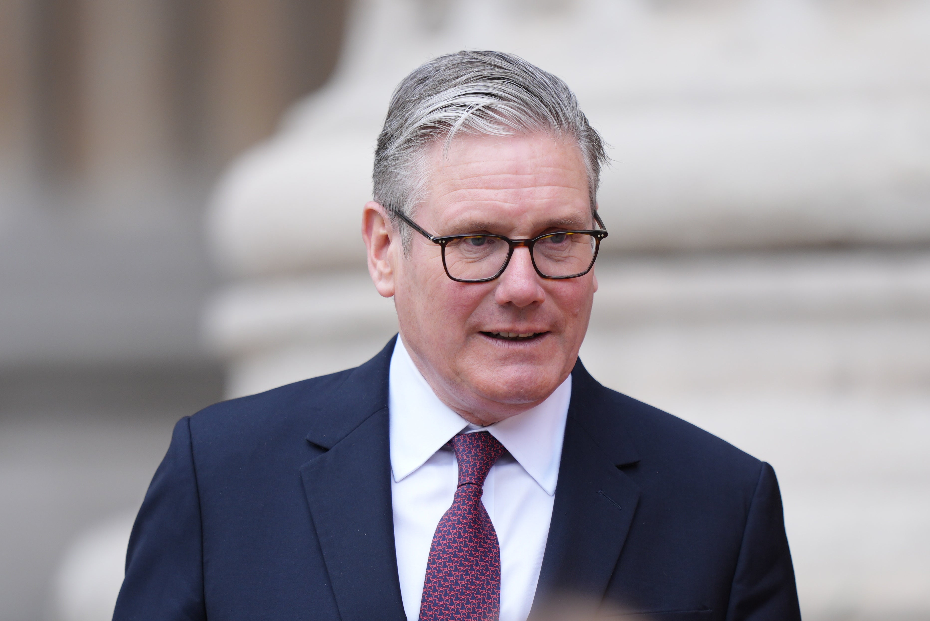 Starmer admitted China poses security threats to the UK but urged for greater business ties