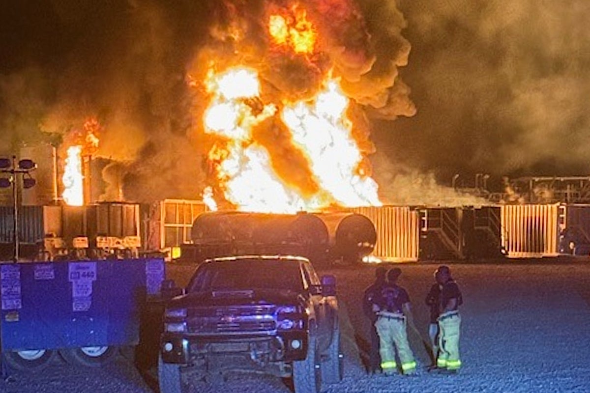 A well site explosion triggers a large fire and evacuations in Texas, but no injuries