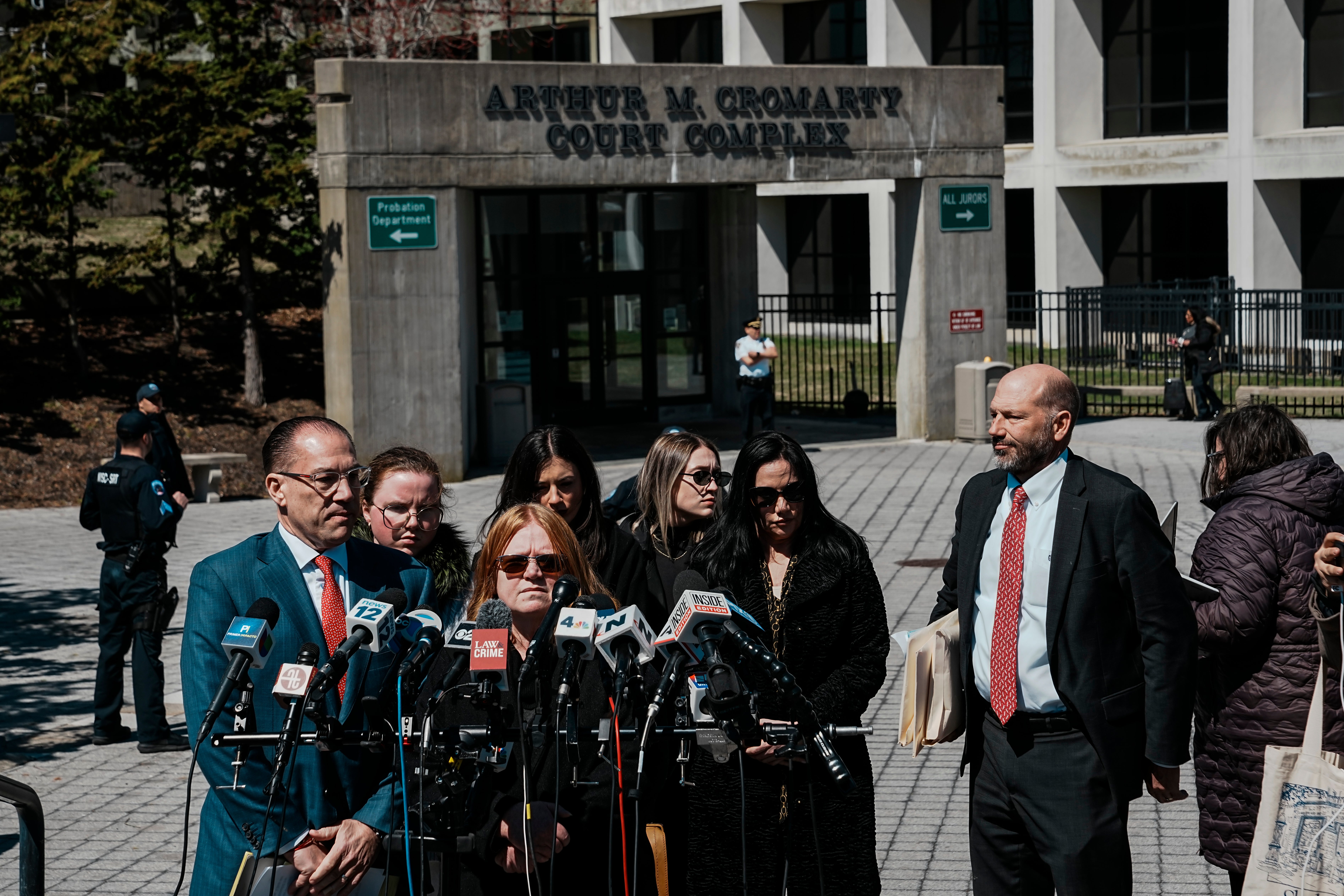Asa Ellerup, wife, of Rex Heuermann gives her statement outside the courthouse, after her husband’s guilty plea