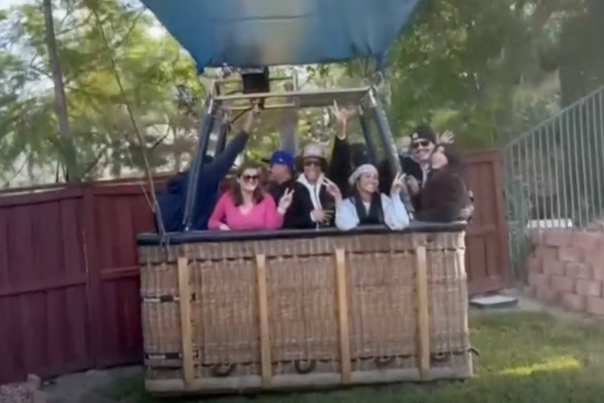 Hot air balloon carrying 13 makes emergency landing in family’s backyard
