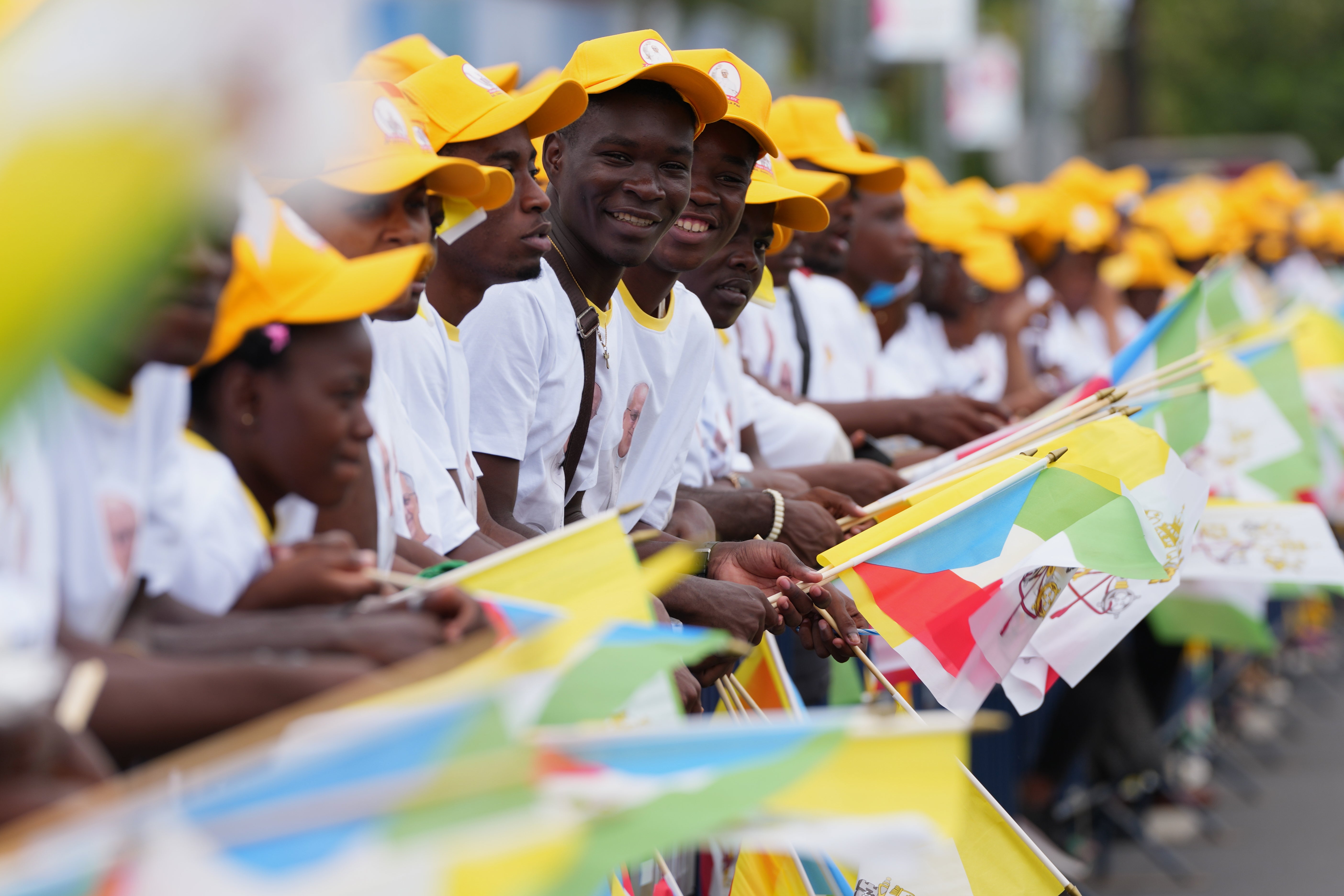 Faithful wait for the arrival of Pope Leo XIV at the airport in Malabo, Equatorial Guinea