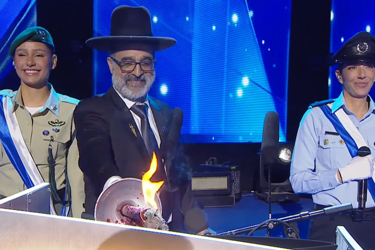 Fury as rabbi who boasted about destroying homes in Gaza lights torch at Israel independence day celebrations Fury as rabbi who boasted about destroying homes in Gaza lights torch at Israel independence day celebrations