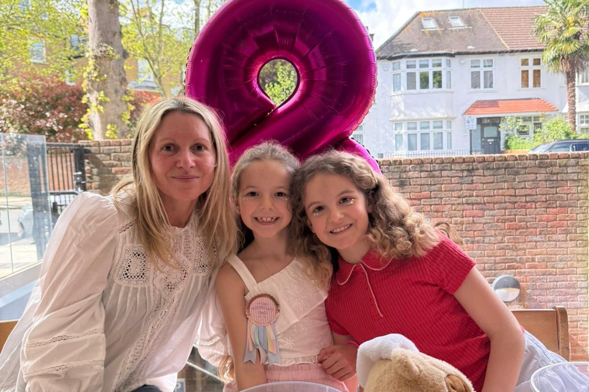 Charlotte with her children, looking refreshed after the non-surgical facelift