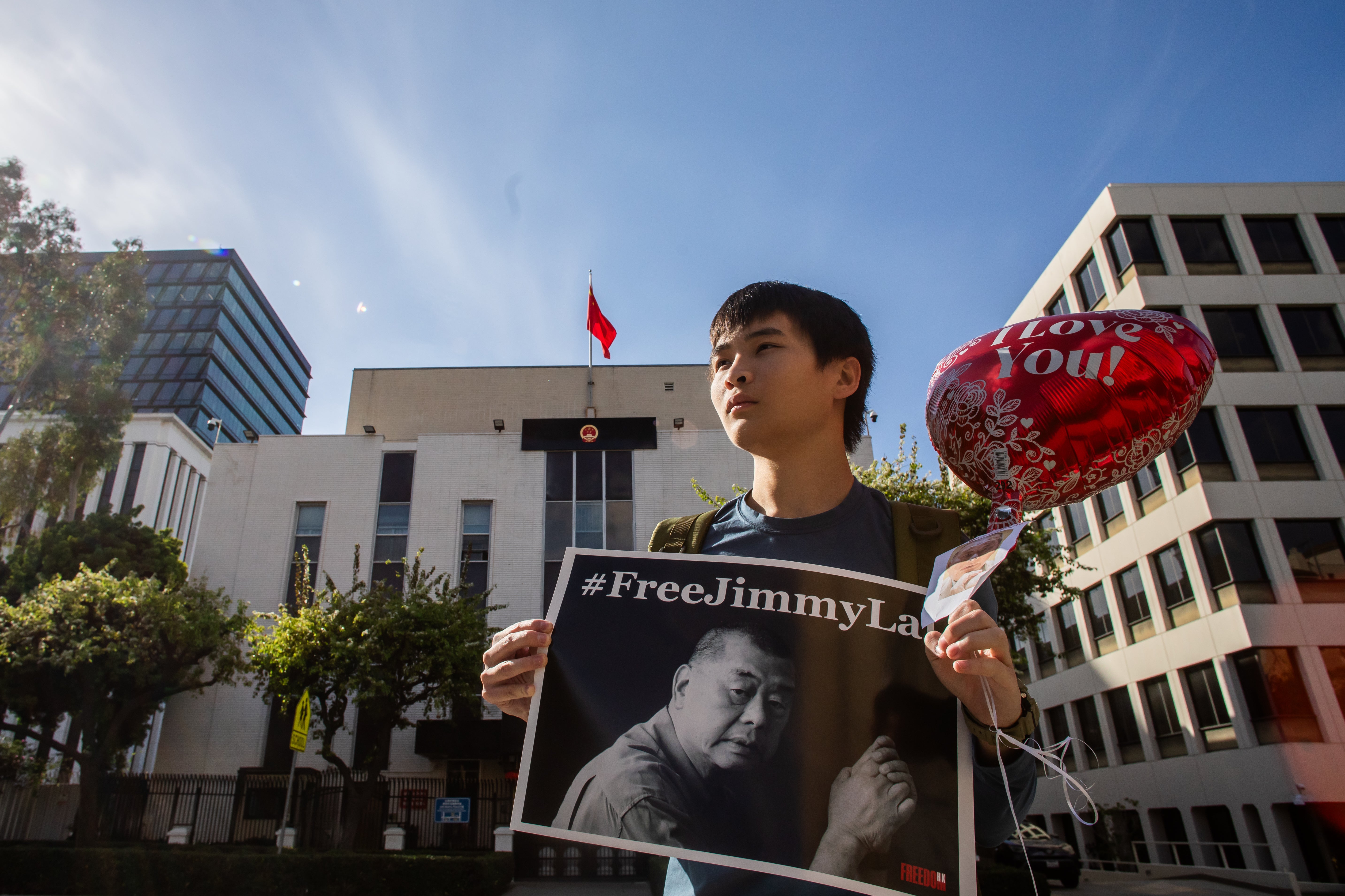 Human Rights activist from Hong Kong Jeffrey Leung gathers with people from the Chinese community in front of the Chinese Consulate General to protest the unjust conviction of media entrepreneur Jimmy Lai on February 14, 2026 in Los Angeles, California