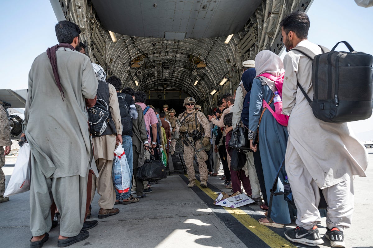 Families trapped in Afghanistan ‘stopped from being evacuated to UK’