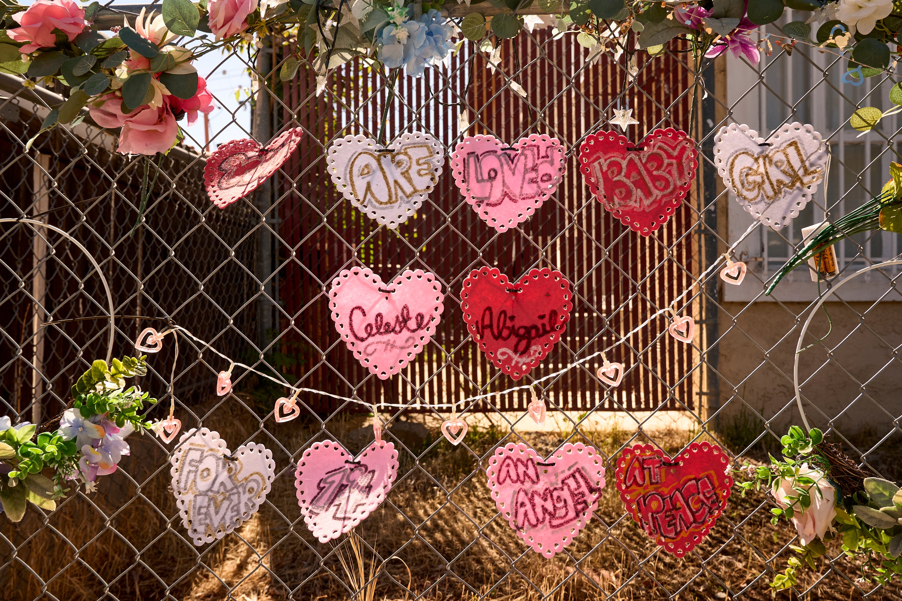 A makeshift Memorial for Celeste Rivas Hernandez is placed outside her home