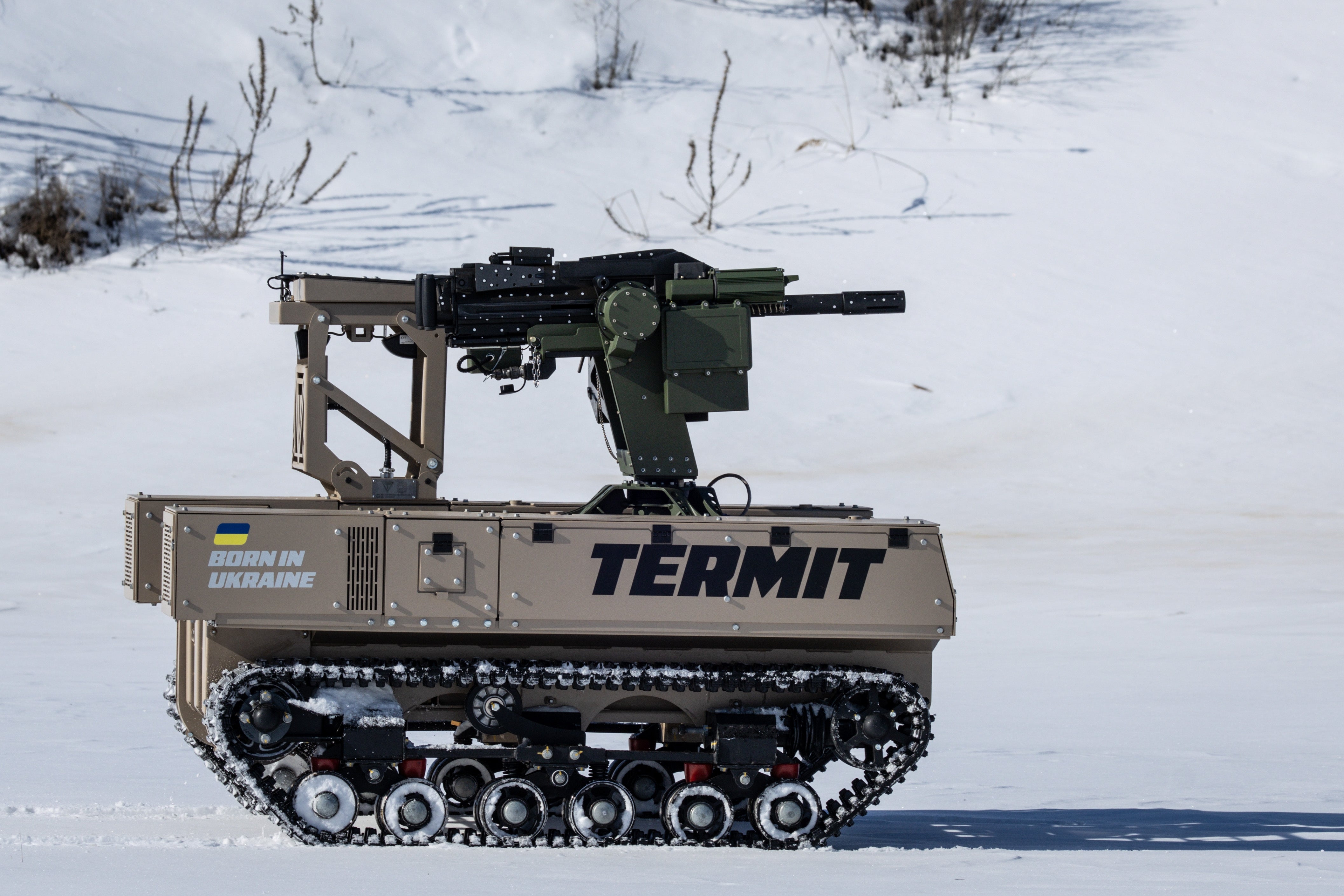 A Tencore Unmanned Ground Vehicle (UGV) TerMIT is seen being driven through the snow in the Kyiv region