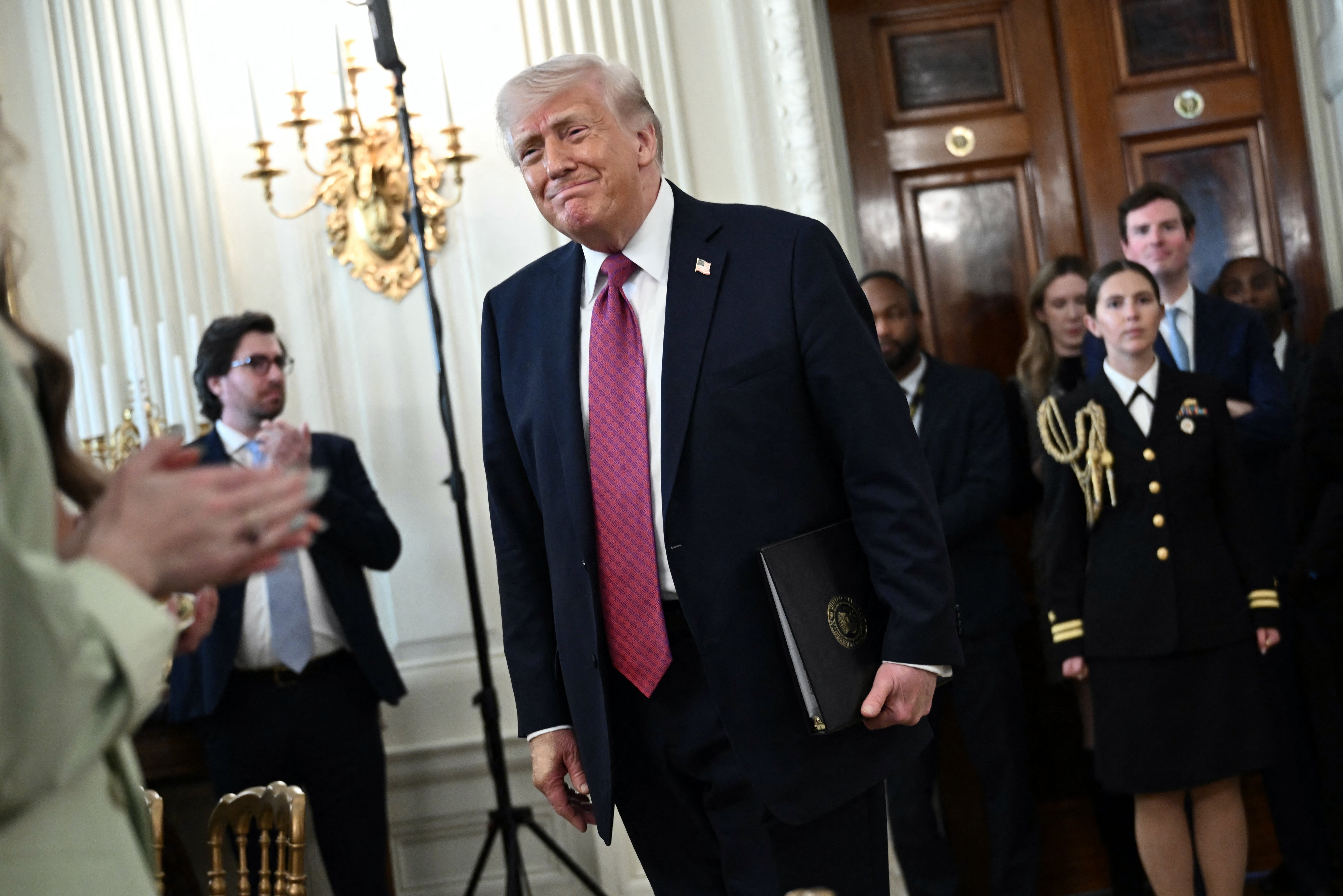 Donald Trump, pictured on Tuesday, has relented on strikes on Iran pending ceasefire talks