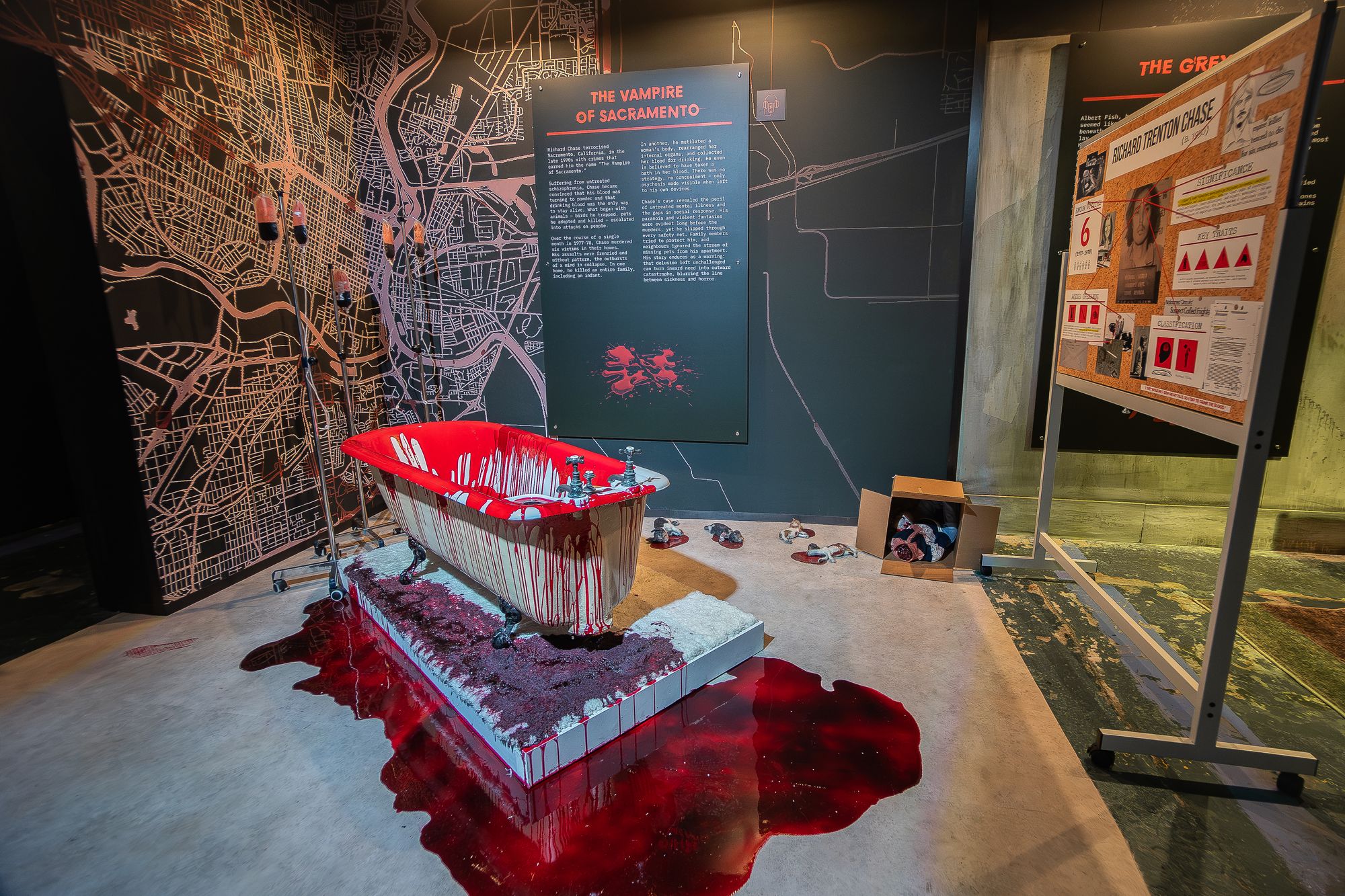 A bathtub sloshing with blood is just one of many graphic scenes attendees will see on their visit to the new exhibit