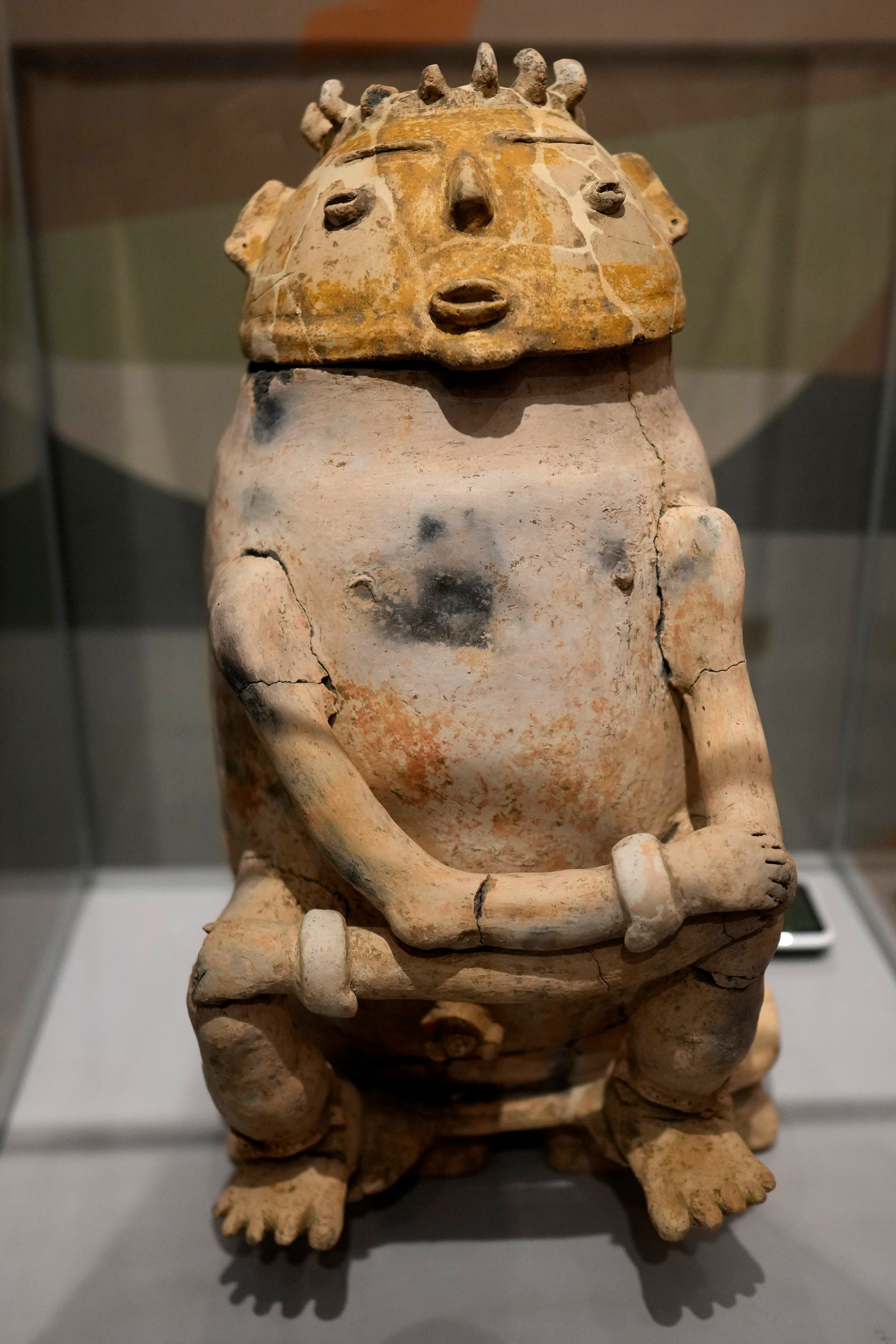 An anthropomorphic ceramic figurine found during archaeological work in a state is displayed at the Institute for Scientific and Technological Research in Macapa, Amapa state, Brazil, Sunday, March 8, 2026. (AP Photo/Eraldo Peres)