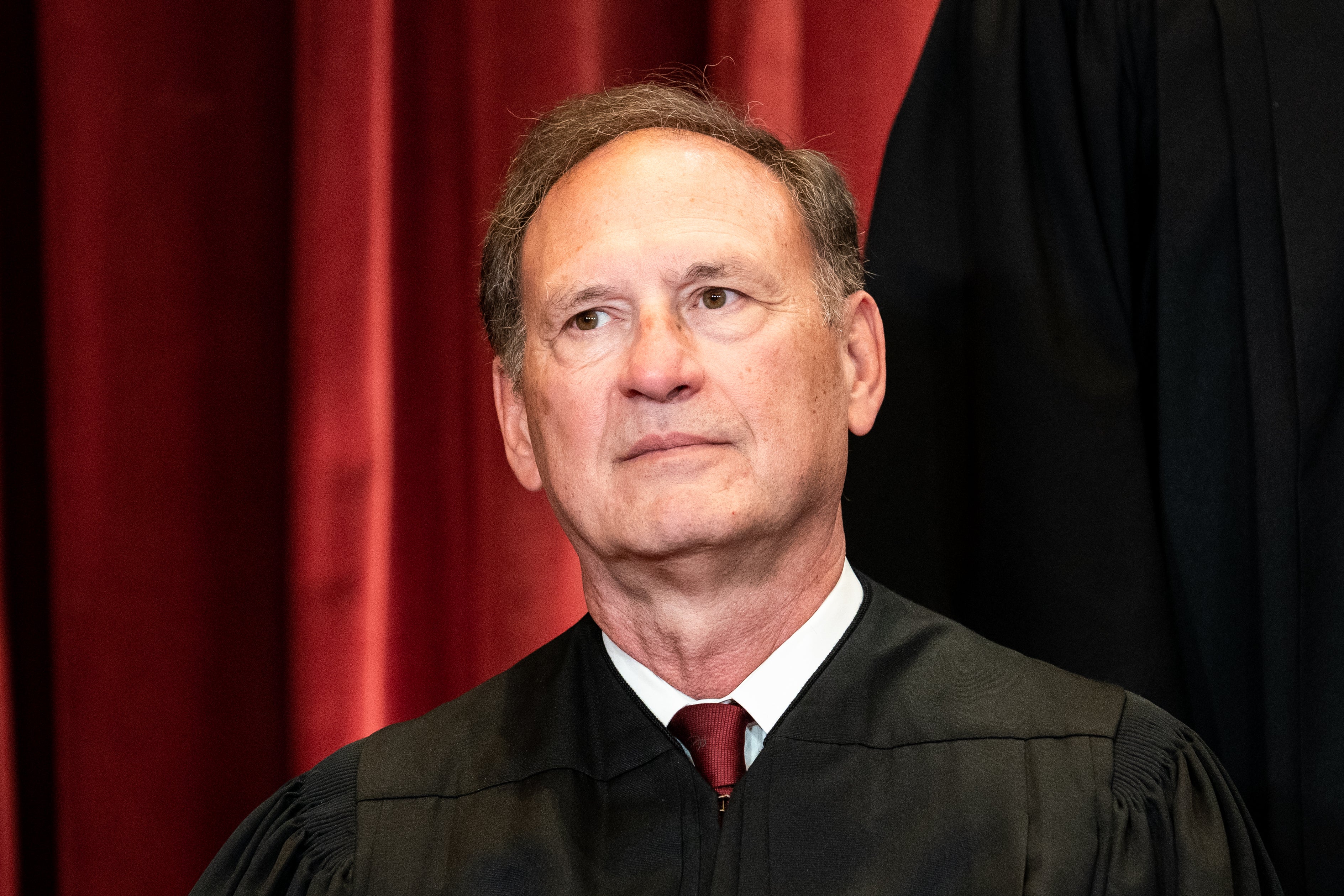 Associate Justice Samuel Alito sits during a group photo of the Justices at the Supreme Court in Washington, DC on April 23, 2021. (Photo by Erin Schaff-Pool/Getty Images)