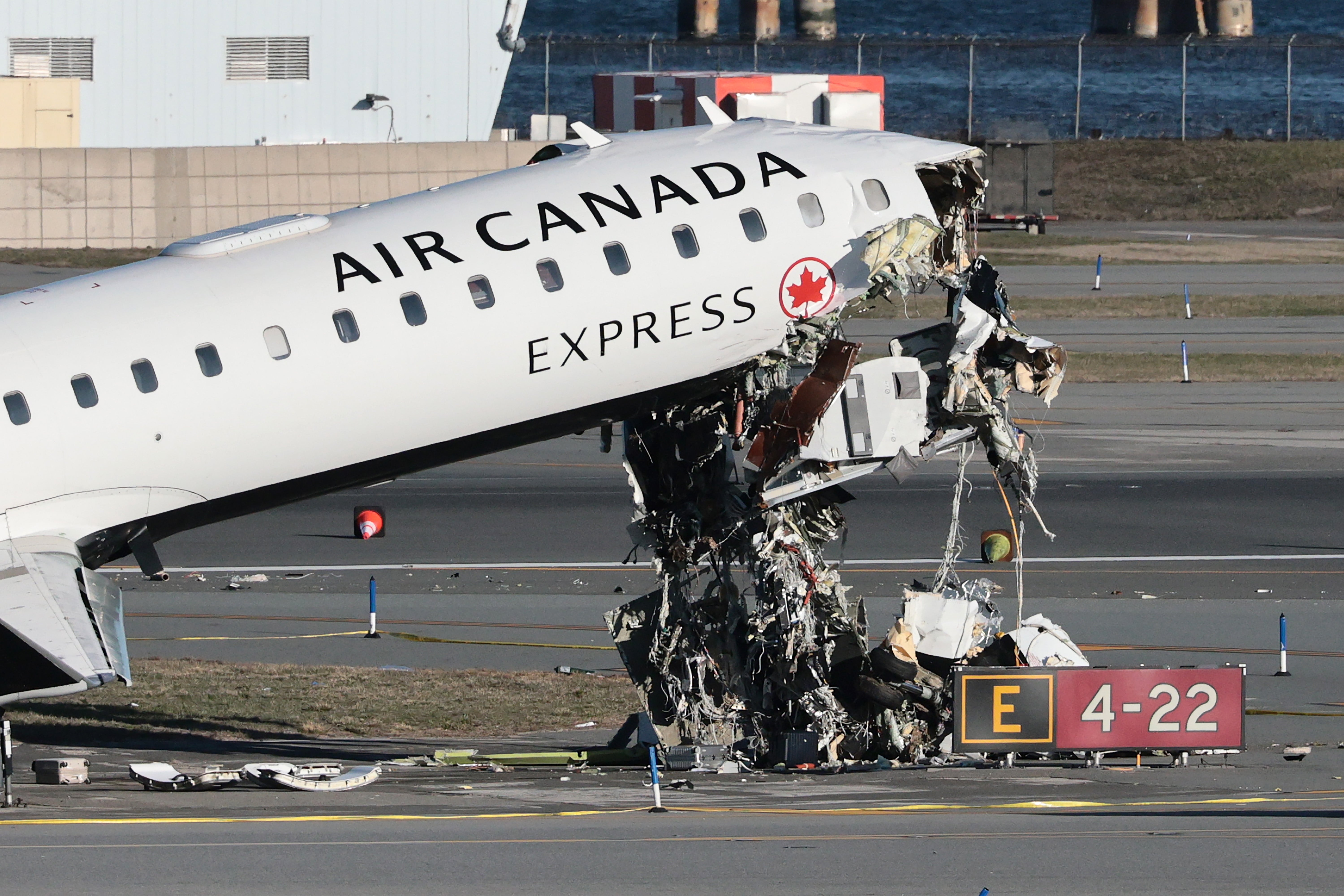 An Air Canada Express plane is seen after colliding with a fire truck, killing two pilots, at New York City’s LaGuardia Airport on March 22, 2026, during a recent rash of mishaps at US airports
