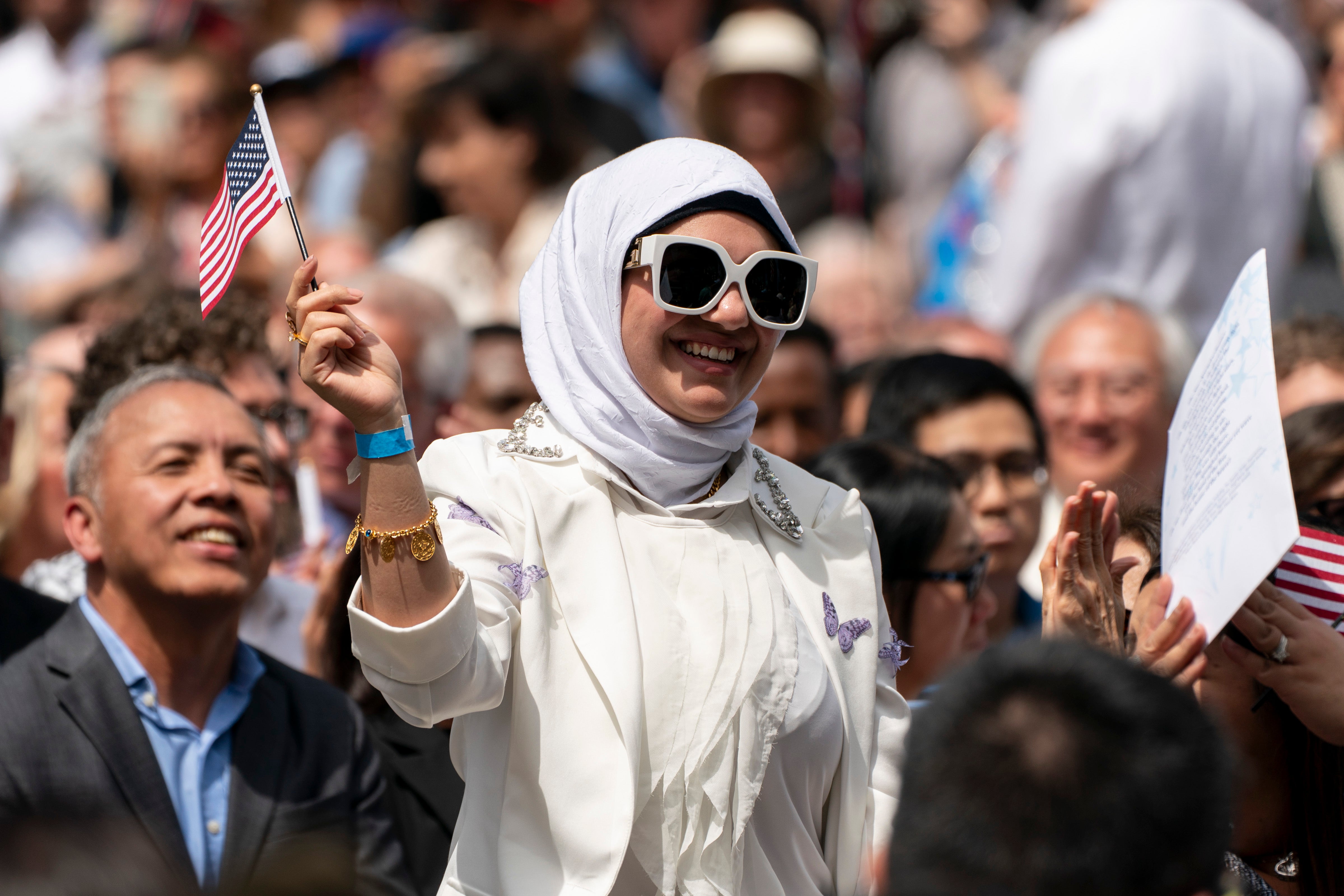 The Department of Justice has identified almost 400 foreign-born people it wants to strip U.S. citizenship from and deport, according to a new report