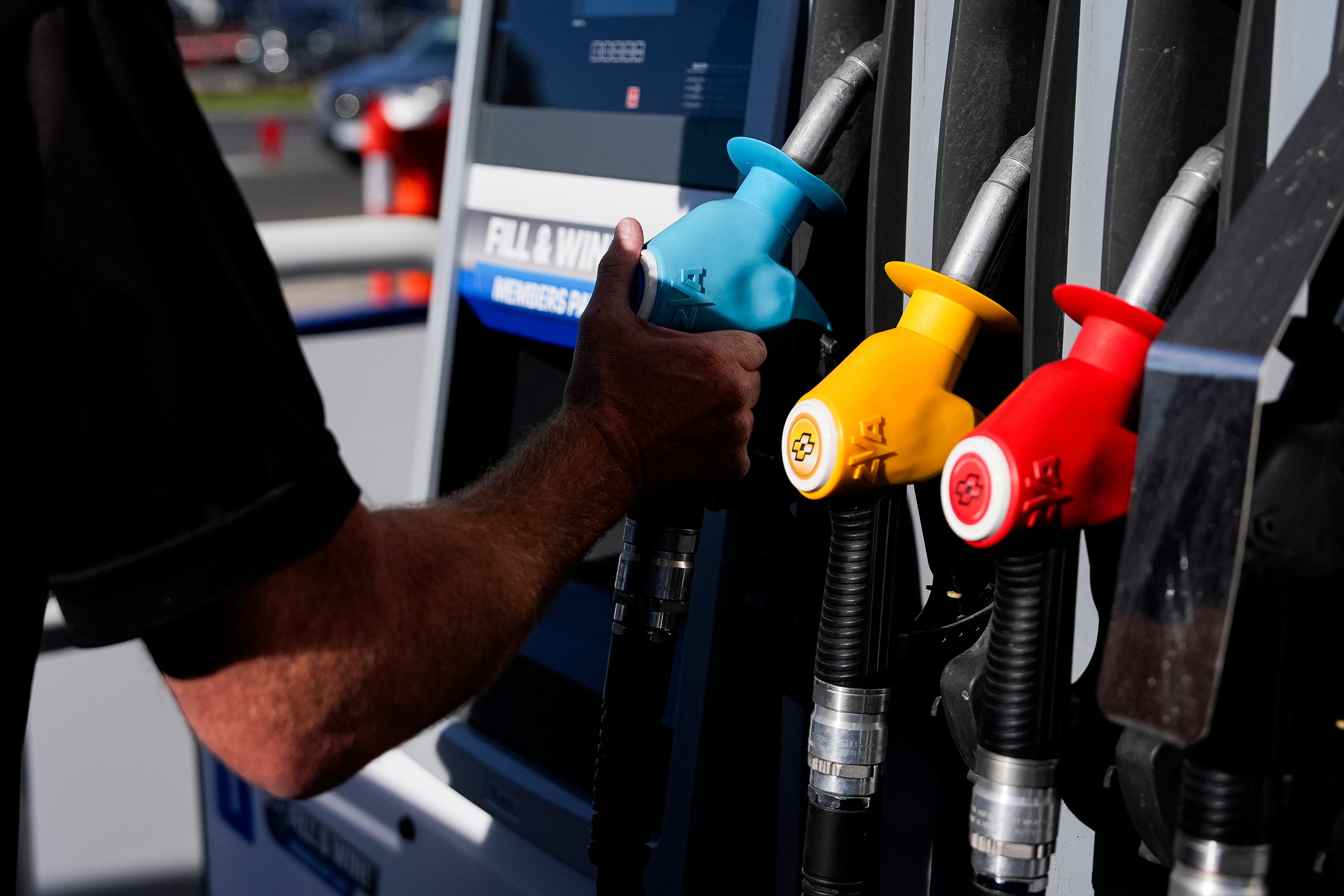 A customer picks up a petrol pump at the first LMCT+ petrol station on 23 April 2026 in Melbourne, Australia