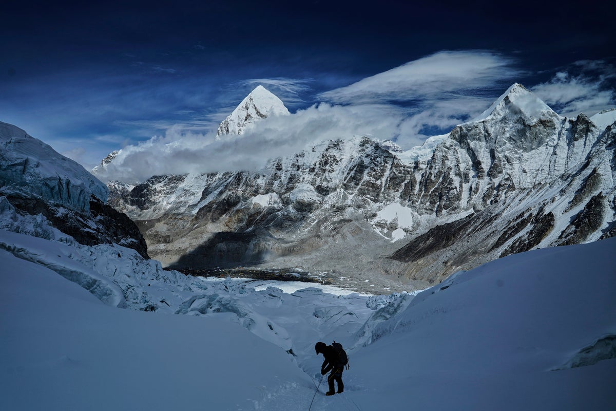 A massive, unstable ice block stalls Everest climbers at base camp