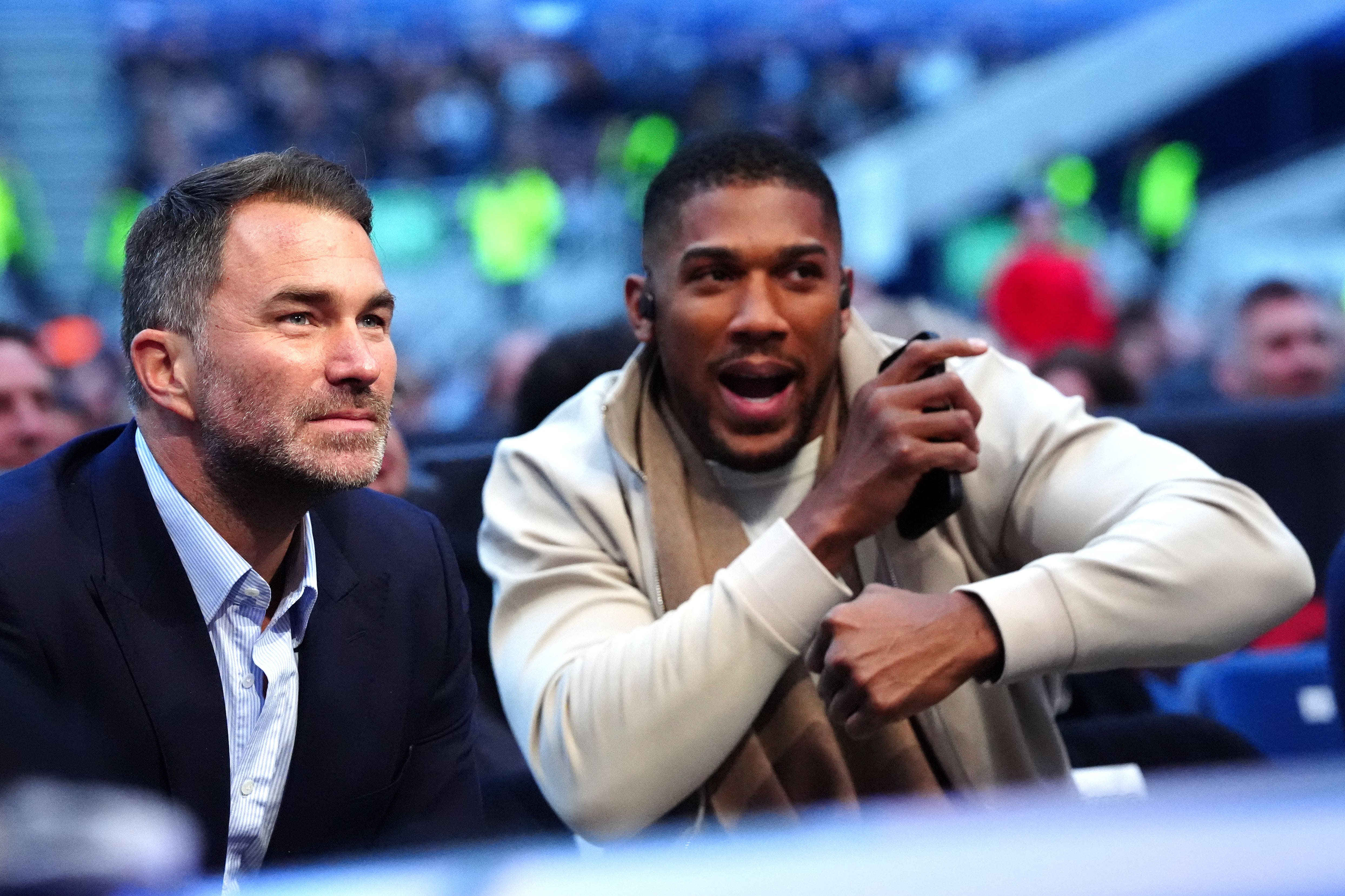 Former world heavyweight champion boxer Anthony Joshua (right) is one of the big names in the match room.