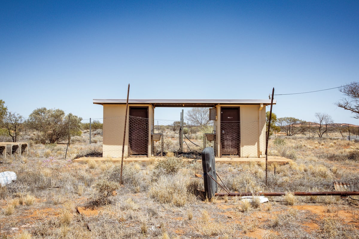 Woman rescued after three hours stuck waist-deep in toilet pit