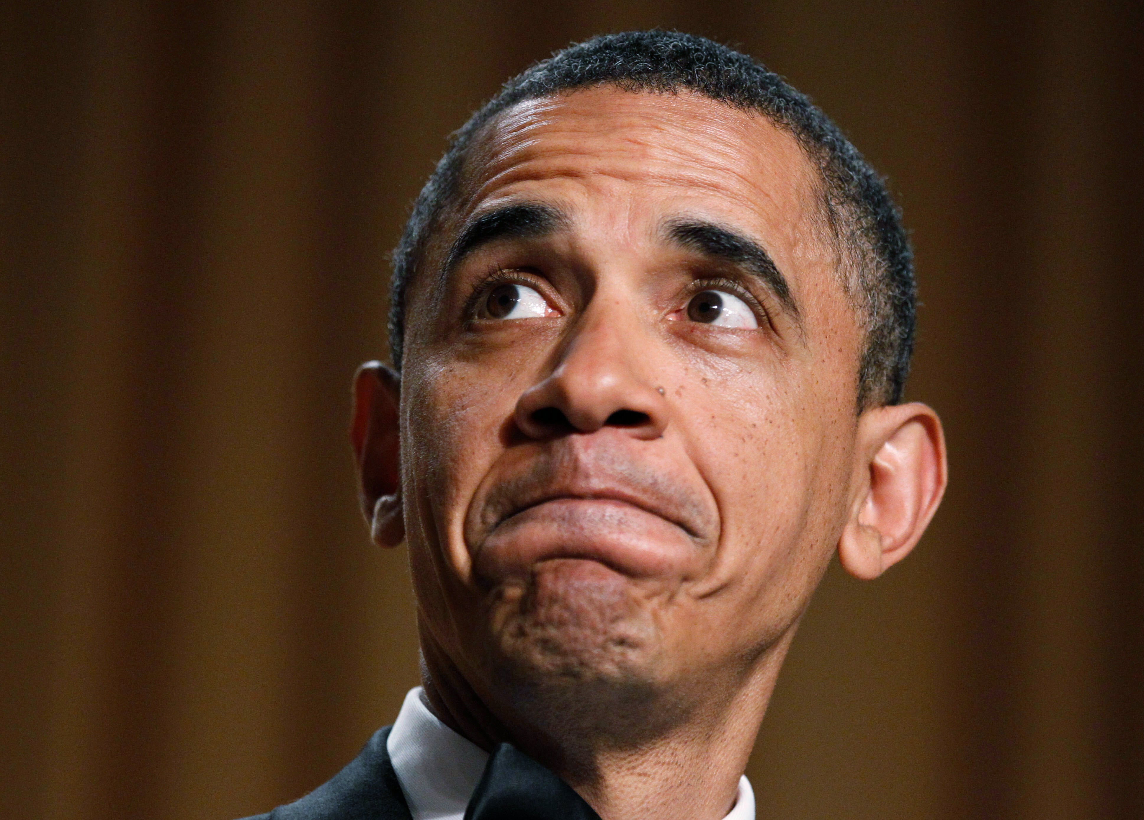 Barack Obama makes a face as they show his video during his speech at the White House Correspondents' Association Dinner in 2011