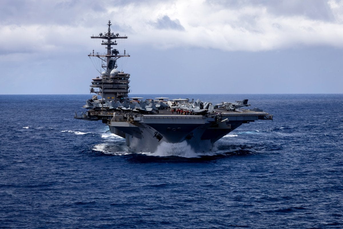 Third US aircraft carrier arrives in Middle East with no end to conflict in sight