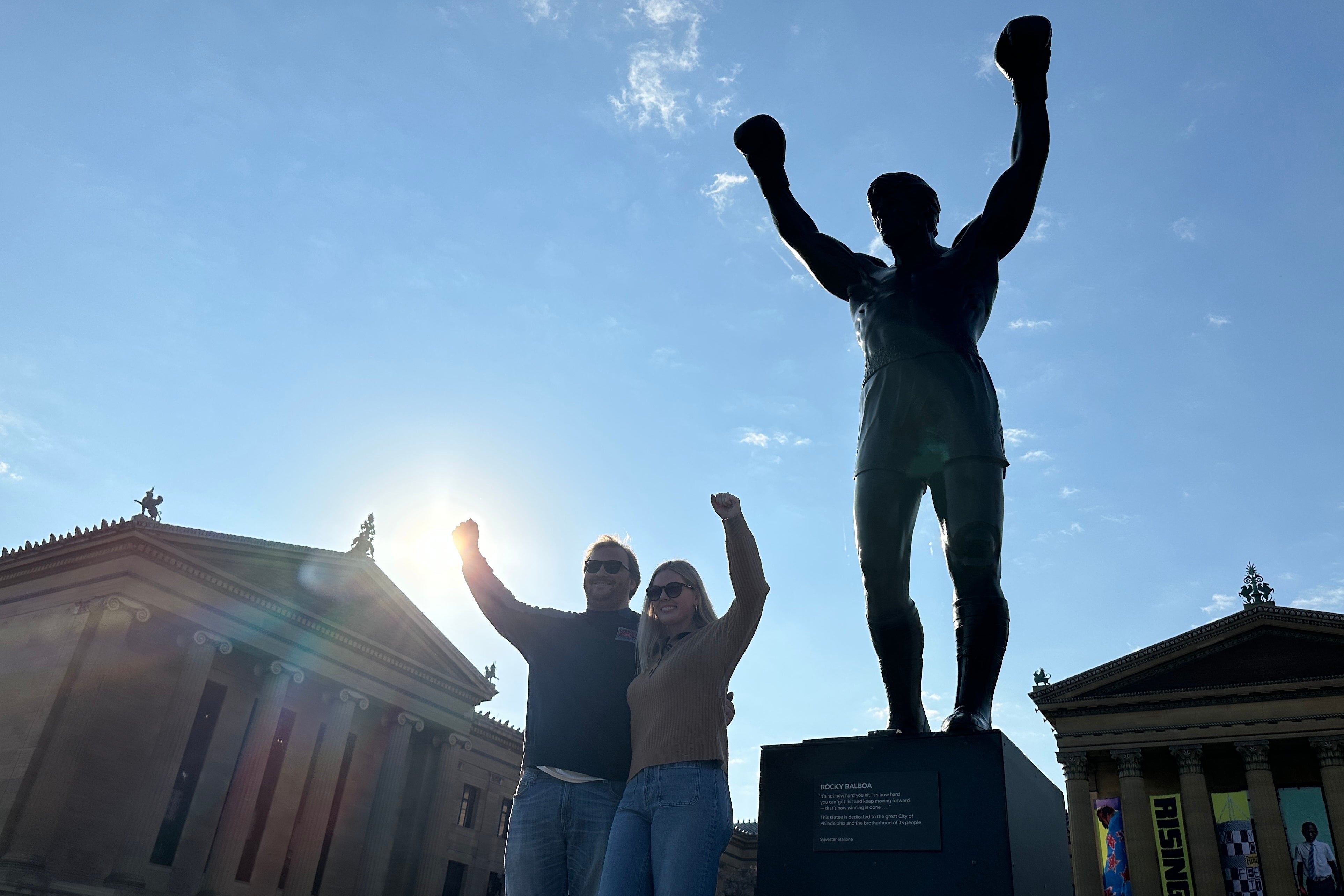 Visitors pose in front of the Rocky statue at the Philadelphia Museum of Art