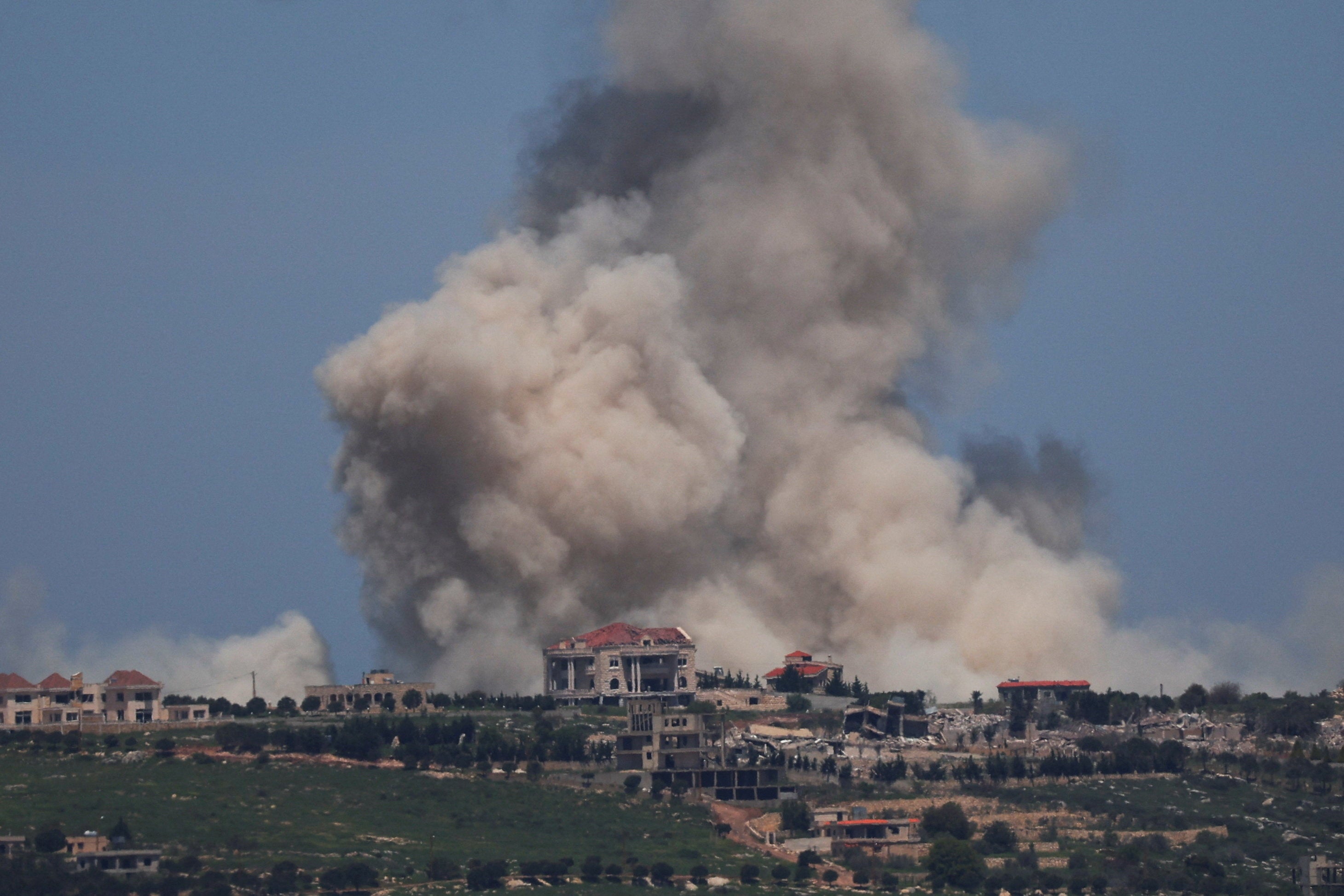 Smoke rises in Lebanon after an explosion, as seen from the Israeli side of the Israel-Lebanon border, in northern Israel, April 25, 2026.
