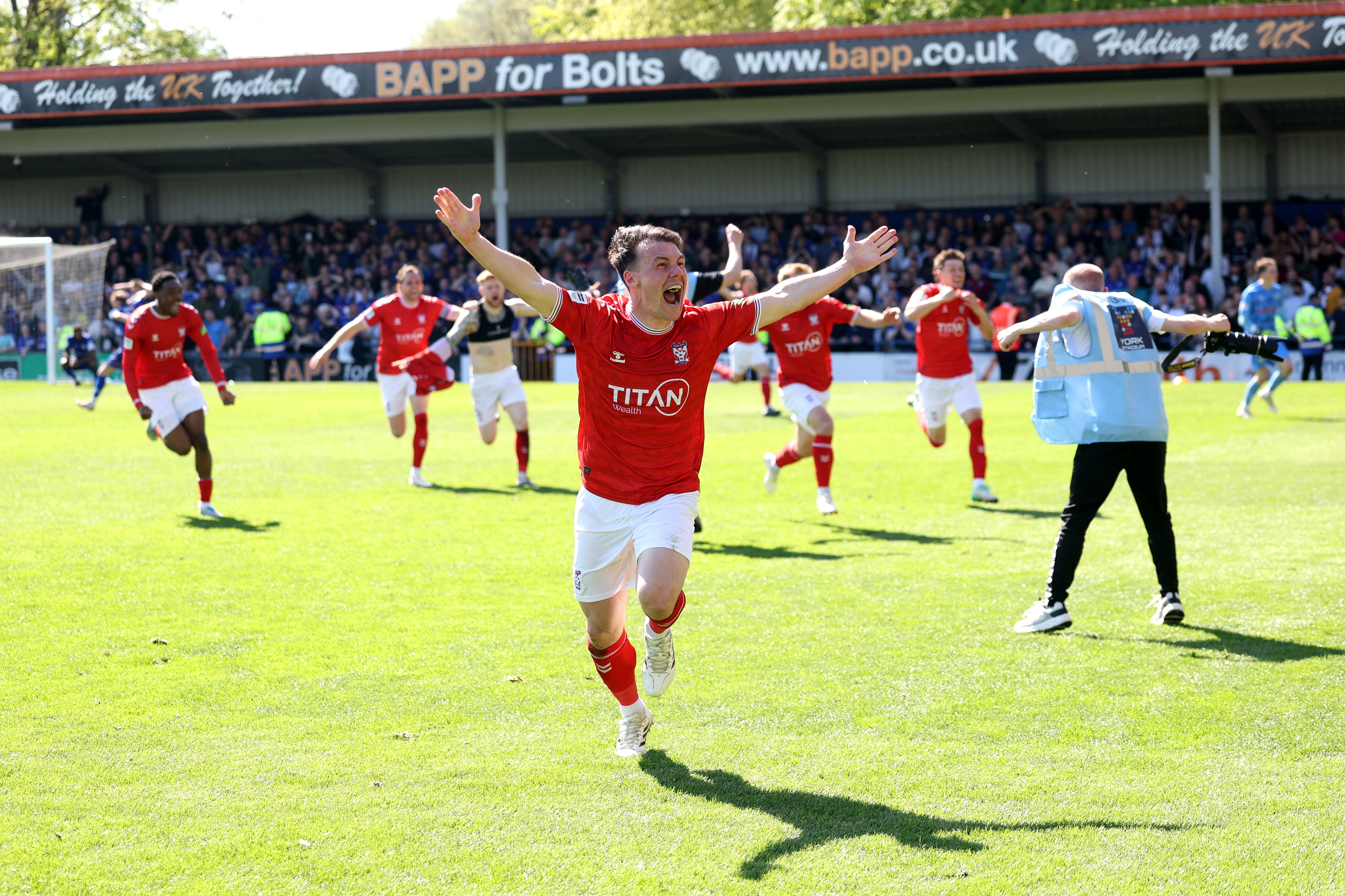 York celebrate after scoring a last-gasp equaliser to seal the National League title