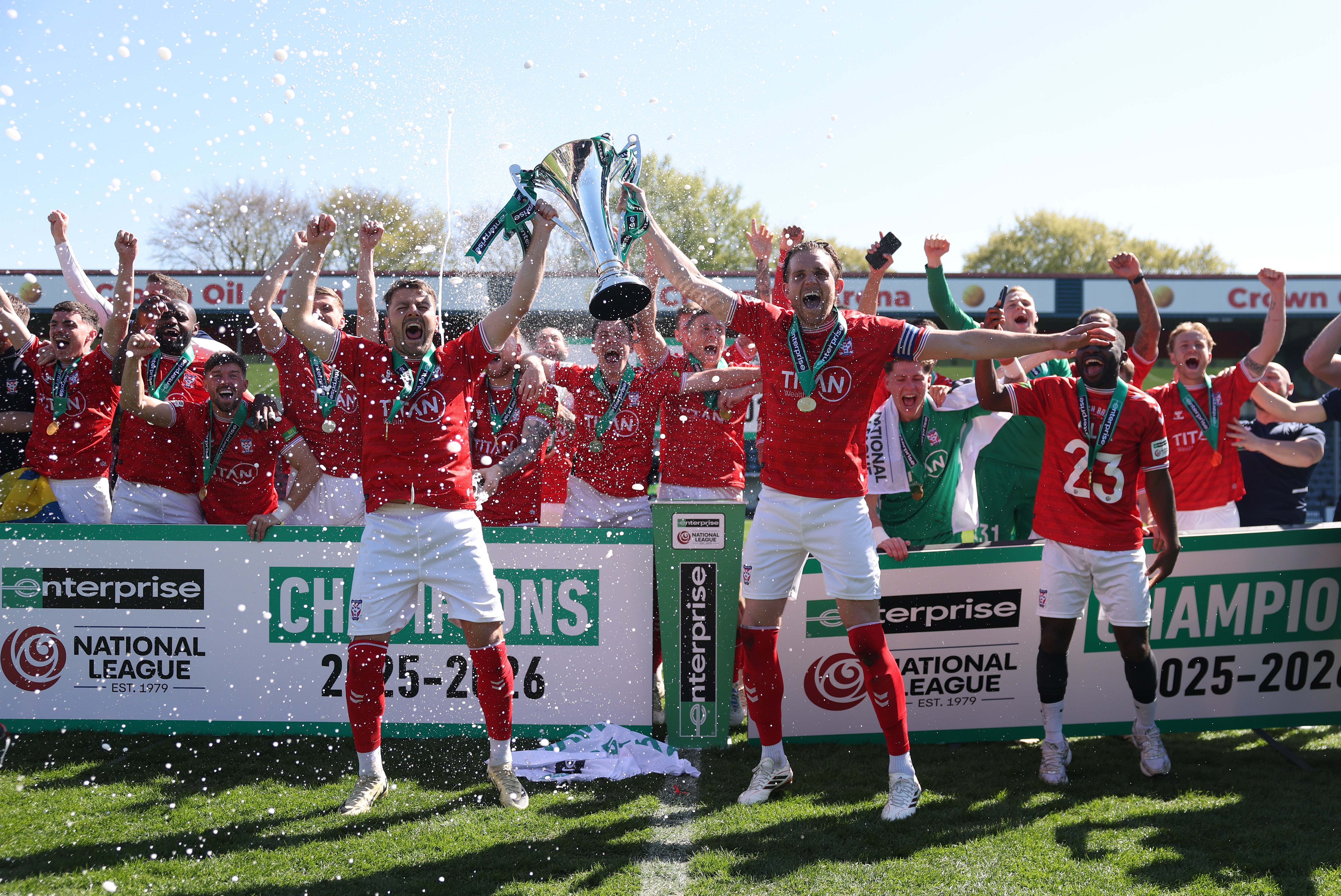 York players lift the National League title at Spotland to end a decade out of the Football League