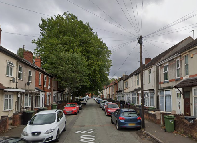 Woman arrested after house fire kills two children