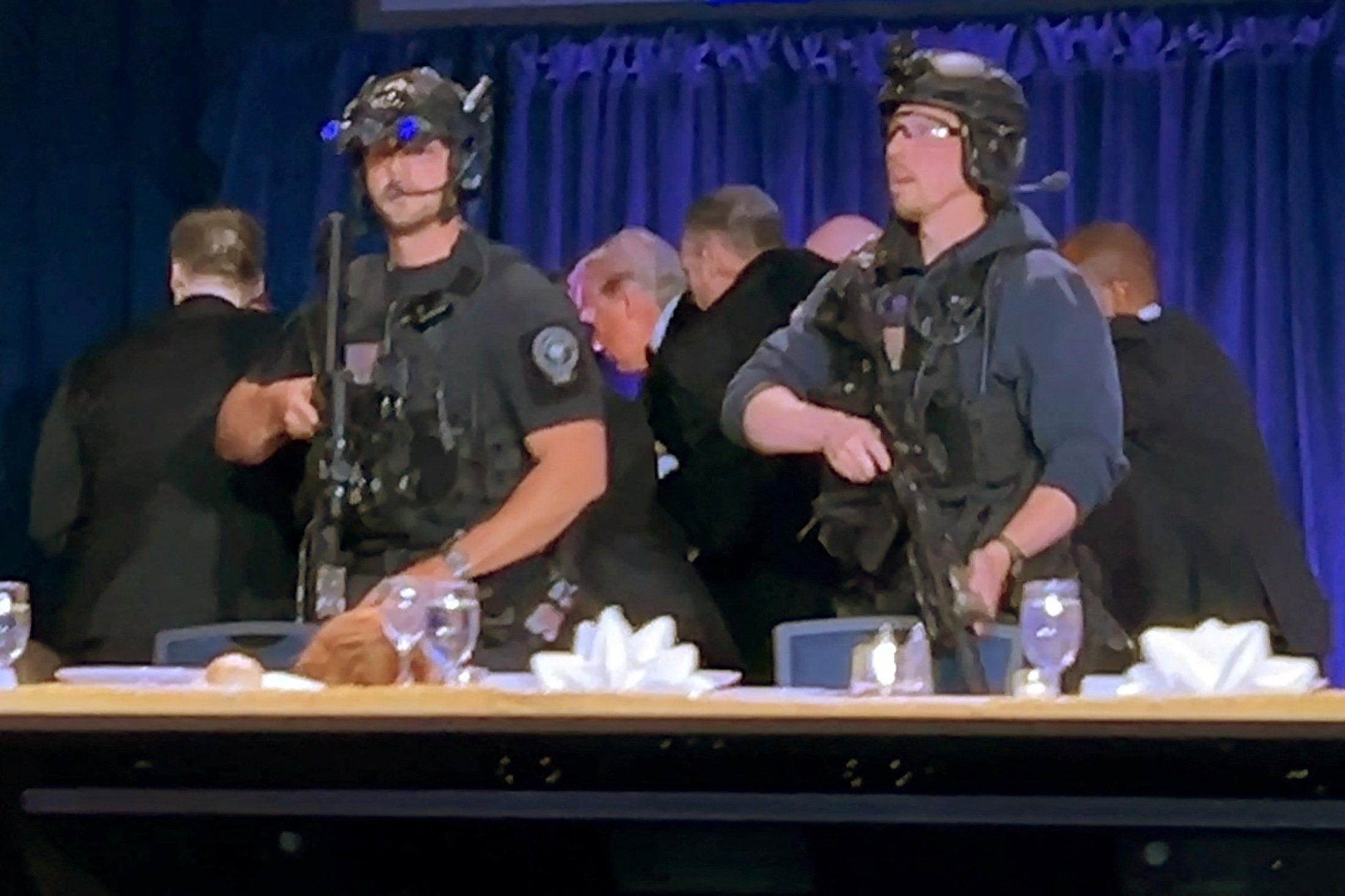 Shortly after the event started, shots rang out and President Donald Trump was rushed from the stage. First lady Melania Trump and other Cabinet members were present for the event