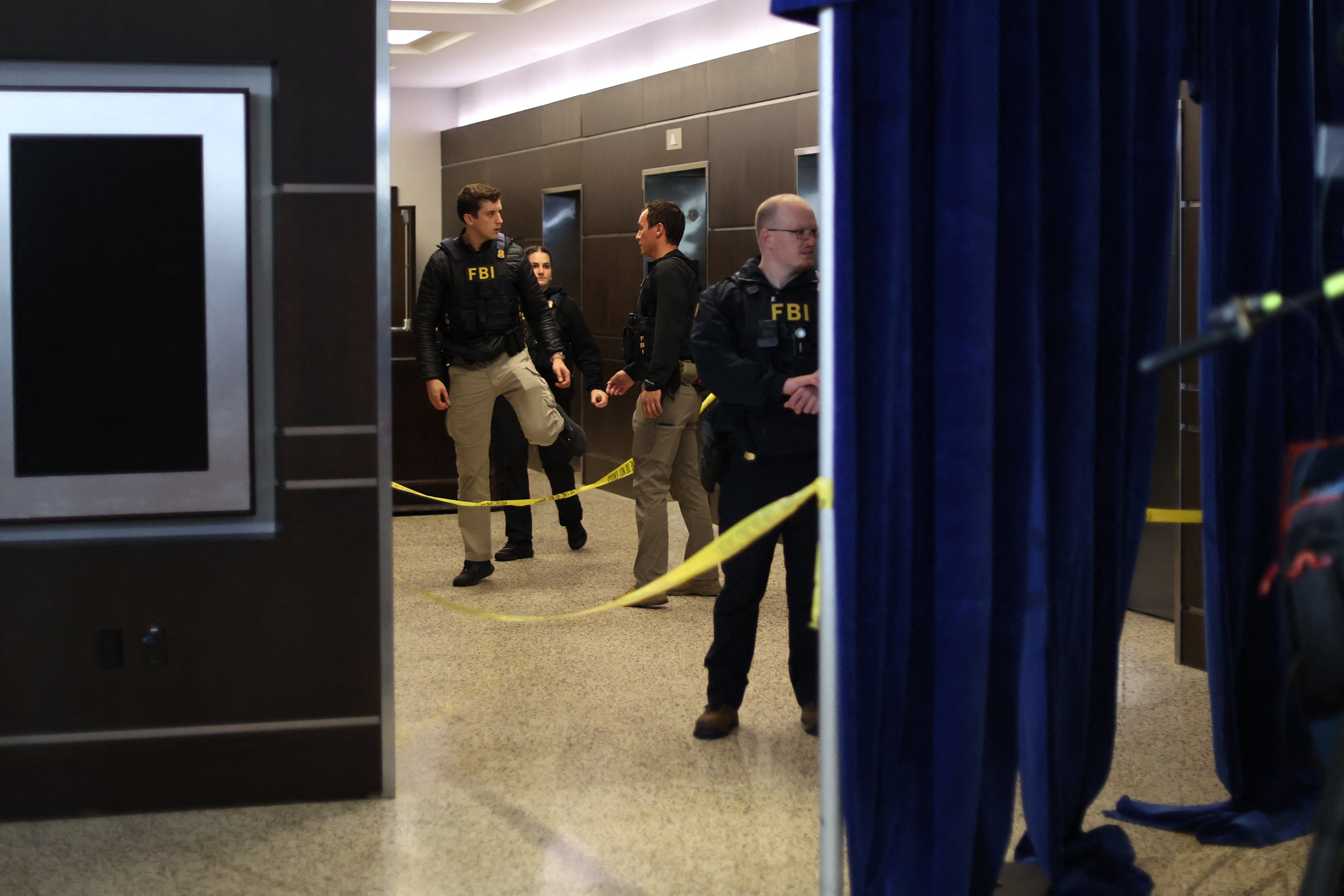 FBI agents are seen at the Washington Hilton after shots were fired